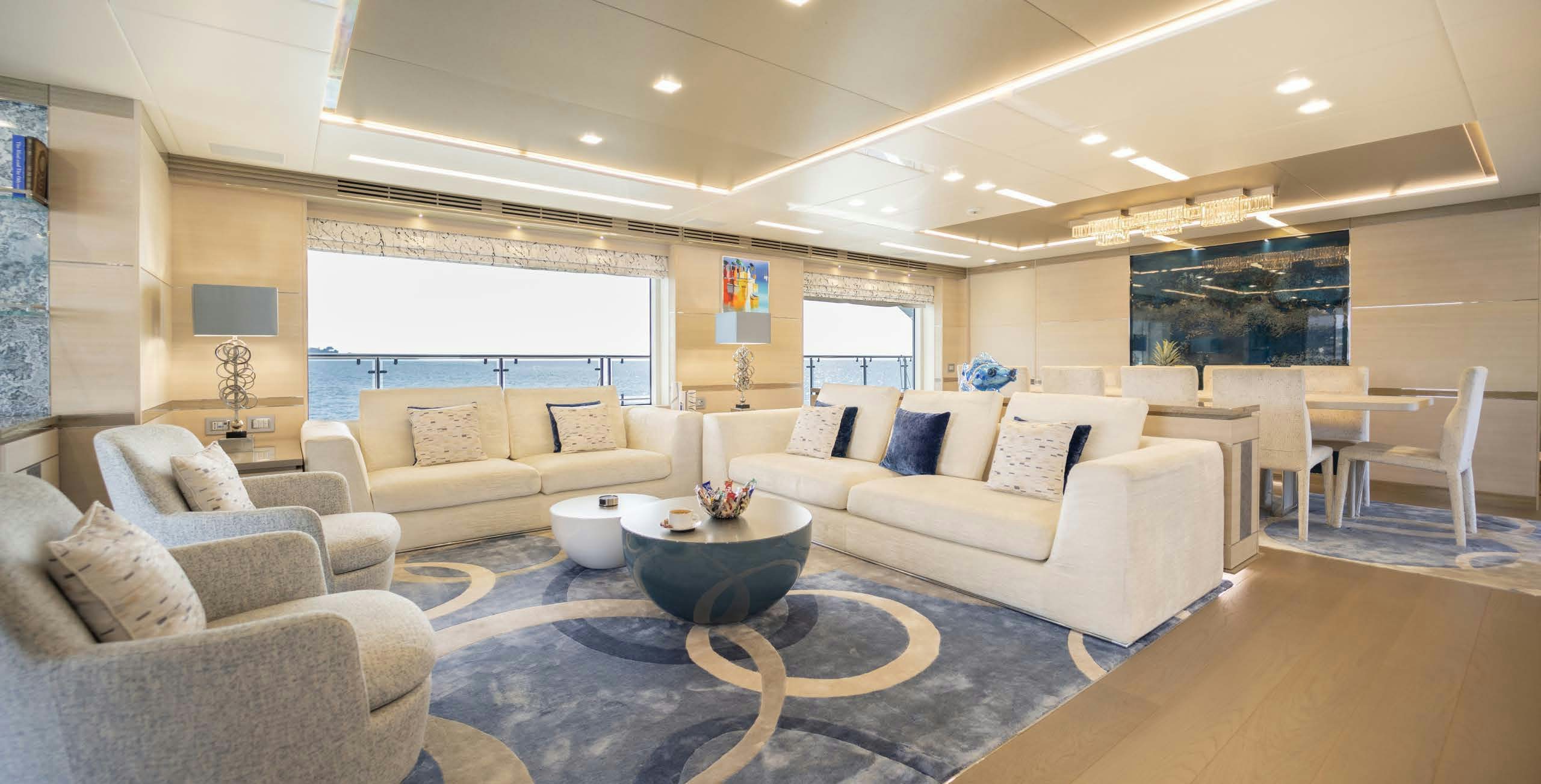 a living room with a large window aboard CHARADE Yacht for Charter