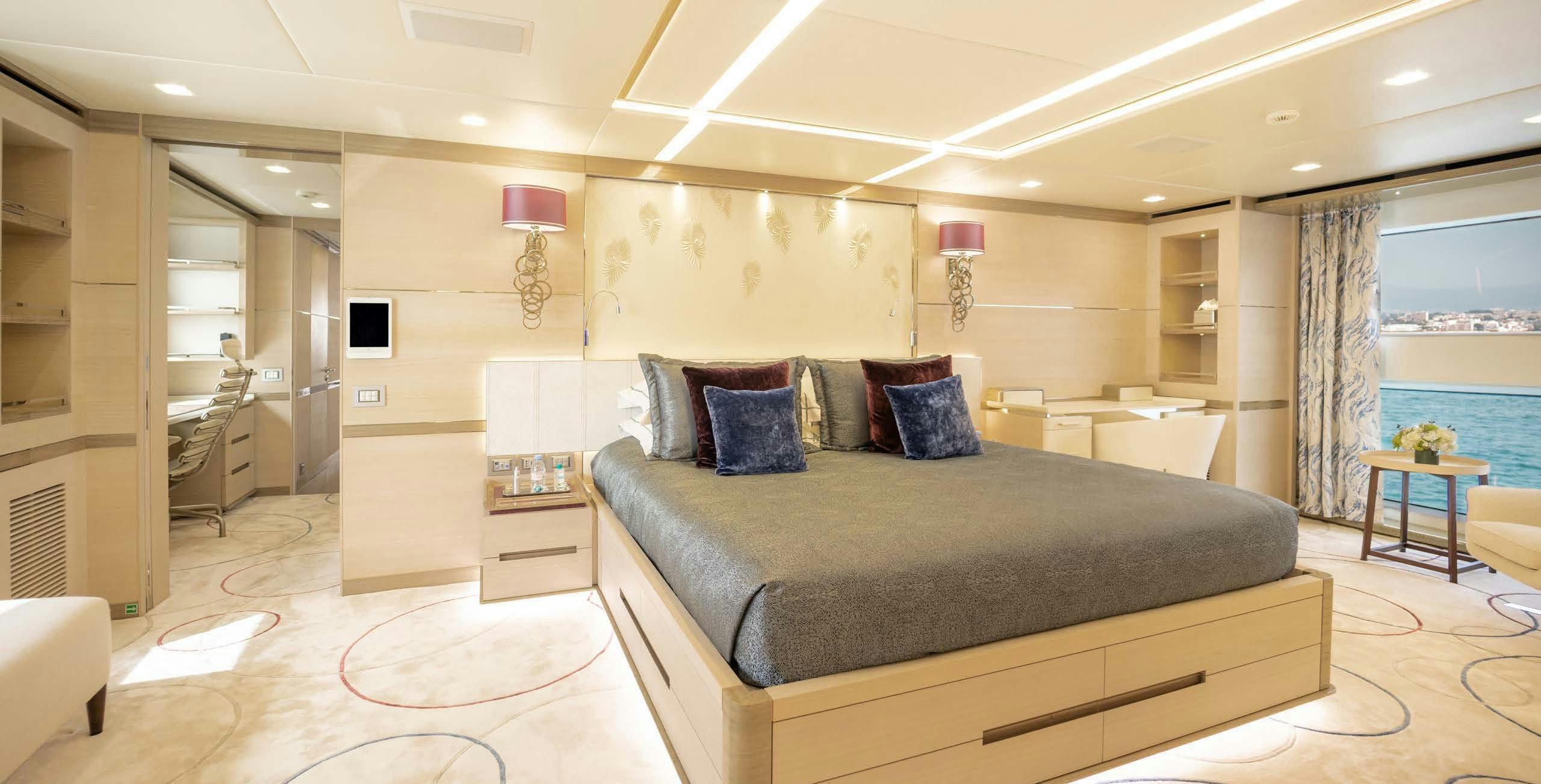 a large bed in a room aboard CHARADE Yacht for Charter