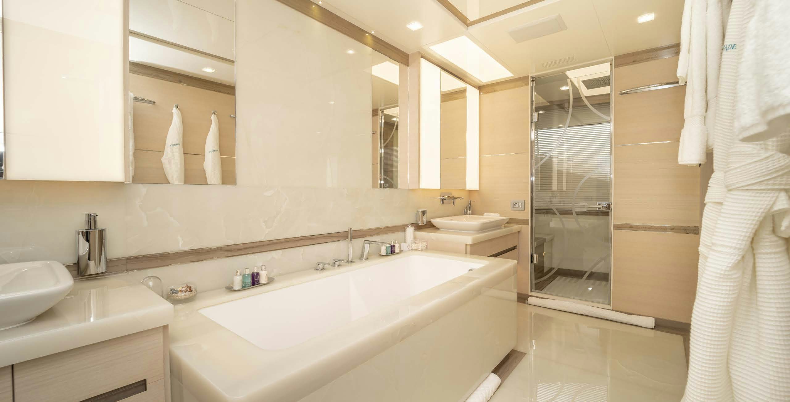 a bathroom with a sink and a shower aboard CHARADE Yacht for Charter