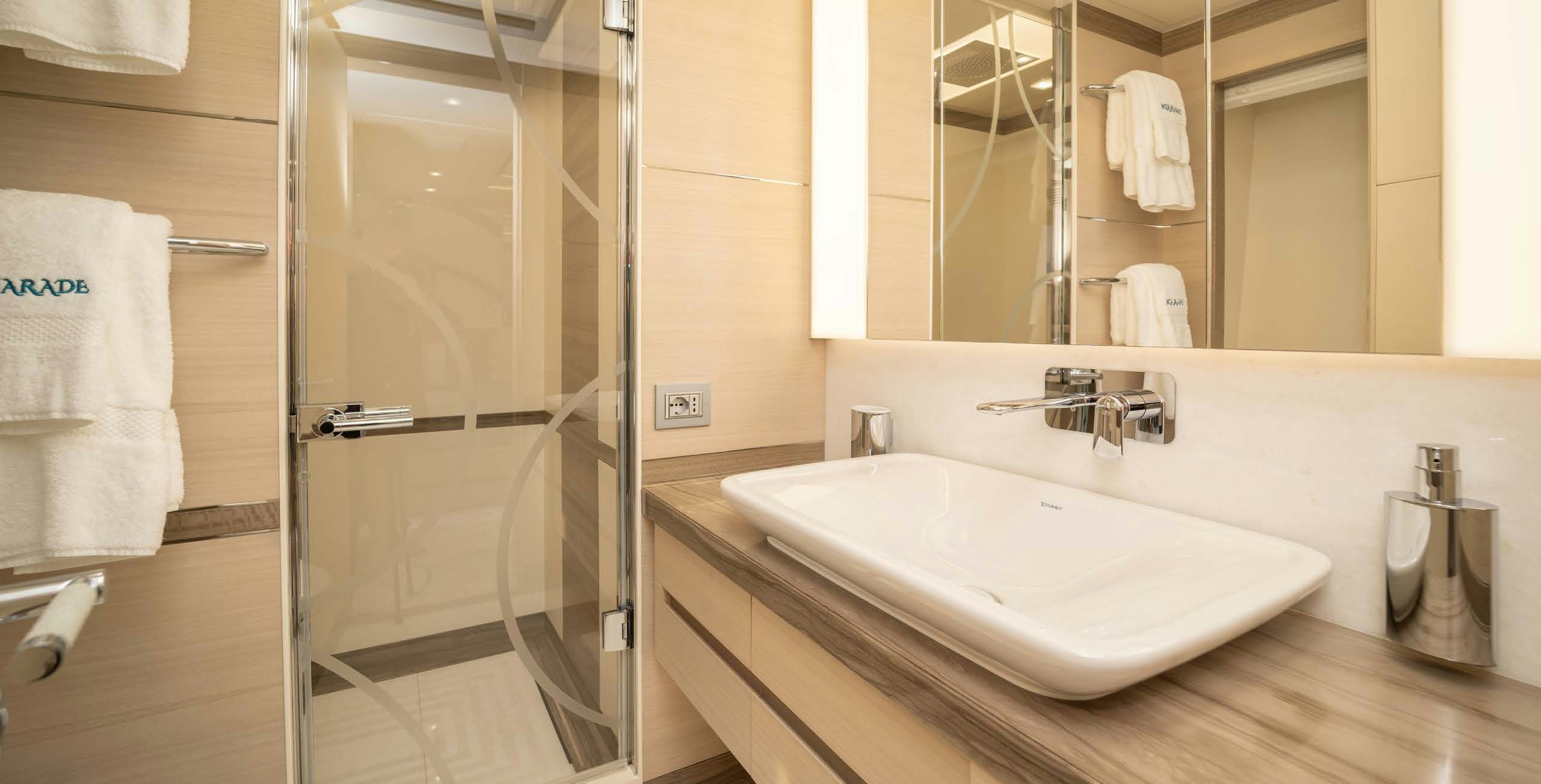 a bathroom with a sink and shower aboard CHARADE Yacht for Charter