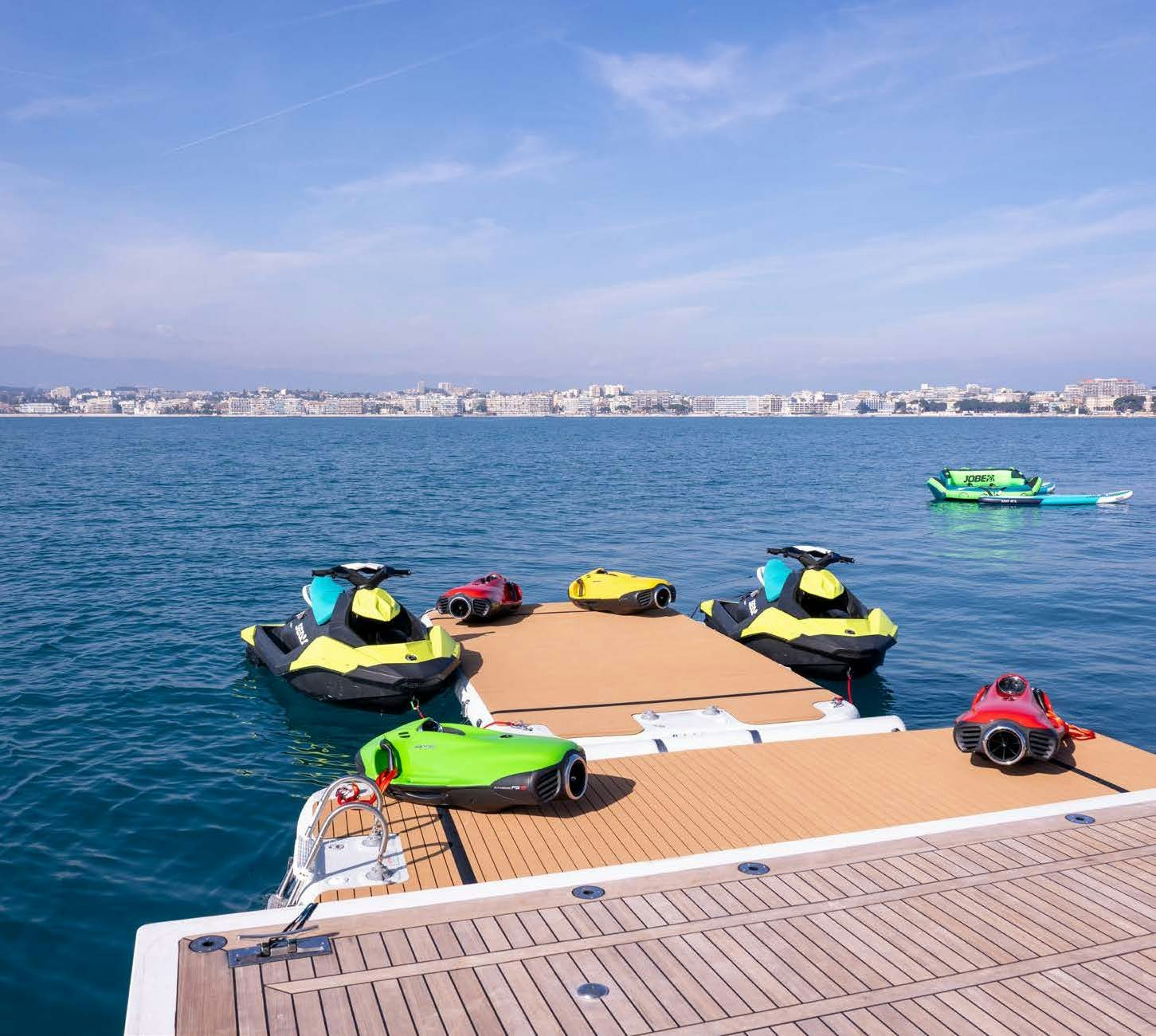 a group of boats on a dock aboard CHARADE Yacht for Charter
