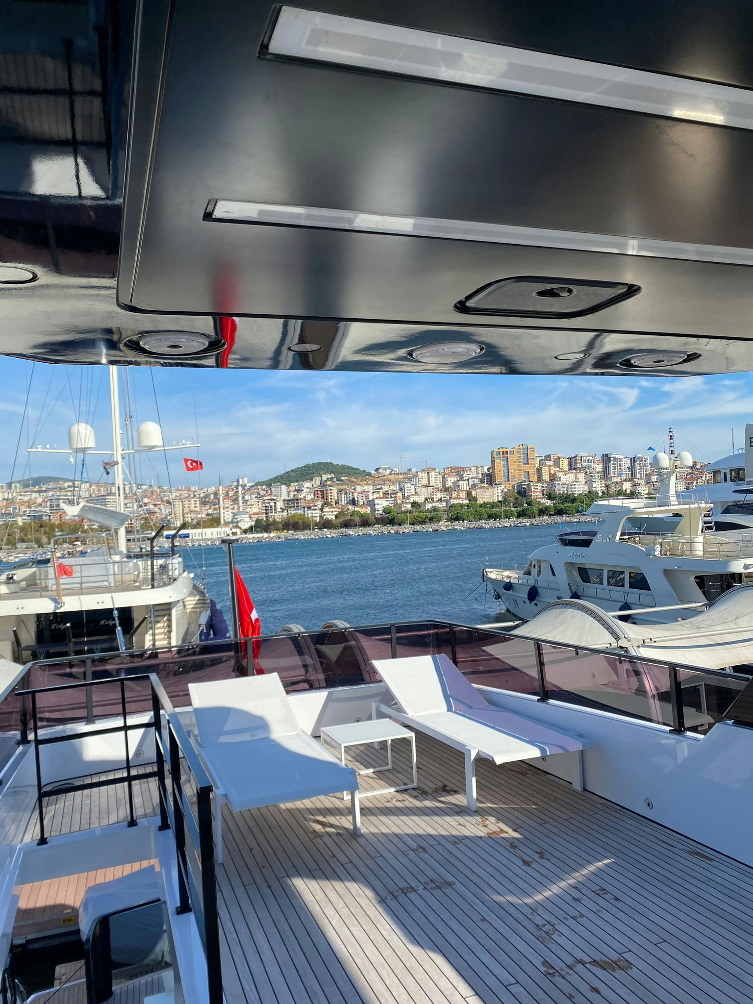 a view of a city from a balcony aboard ZIMA Yacht for Sale