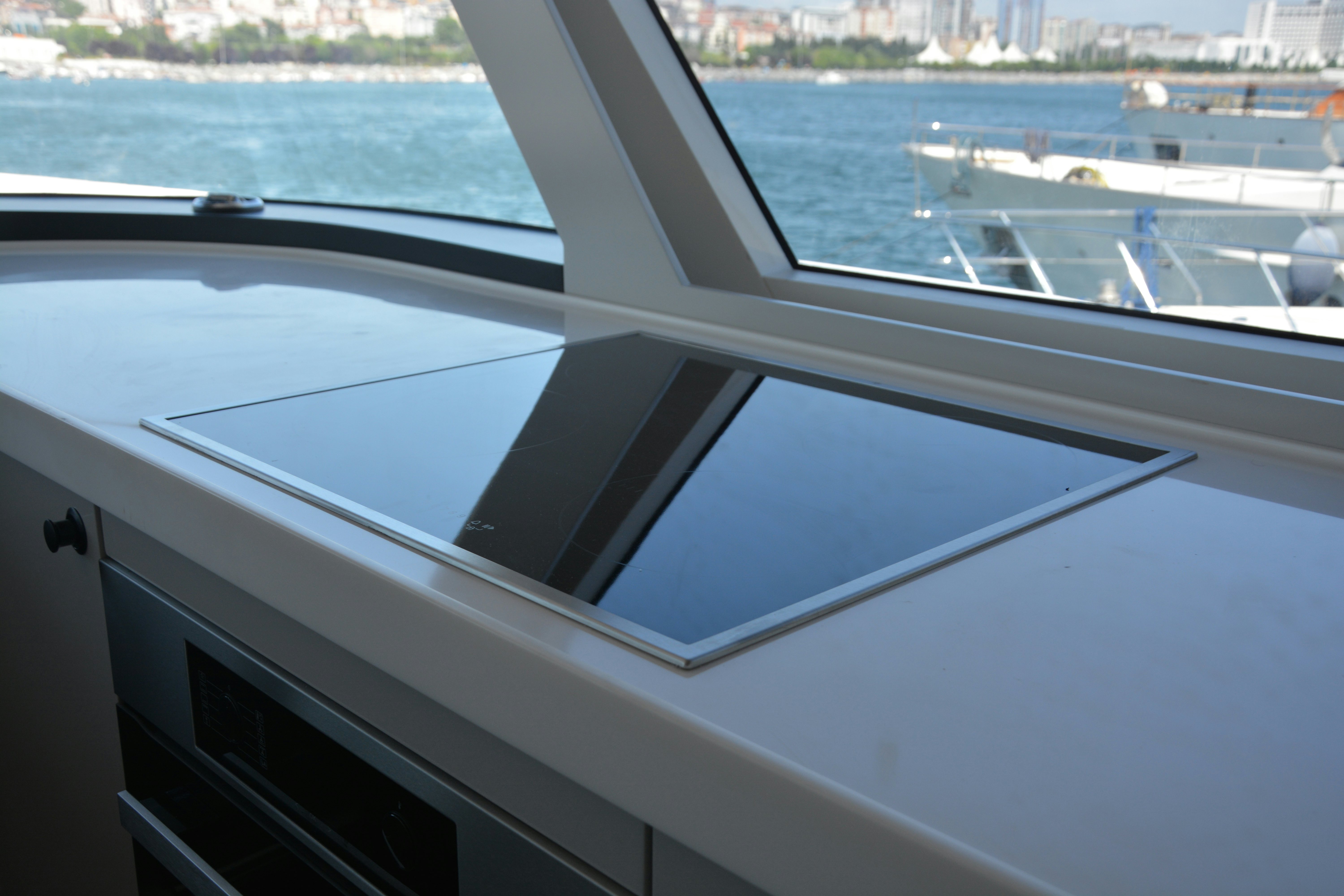 a view of a boat from the window of a boat aboard ZIMA Yacht for Sale