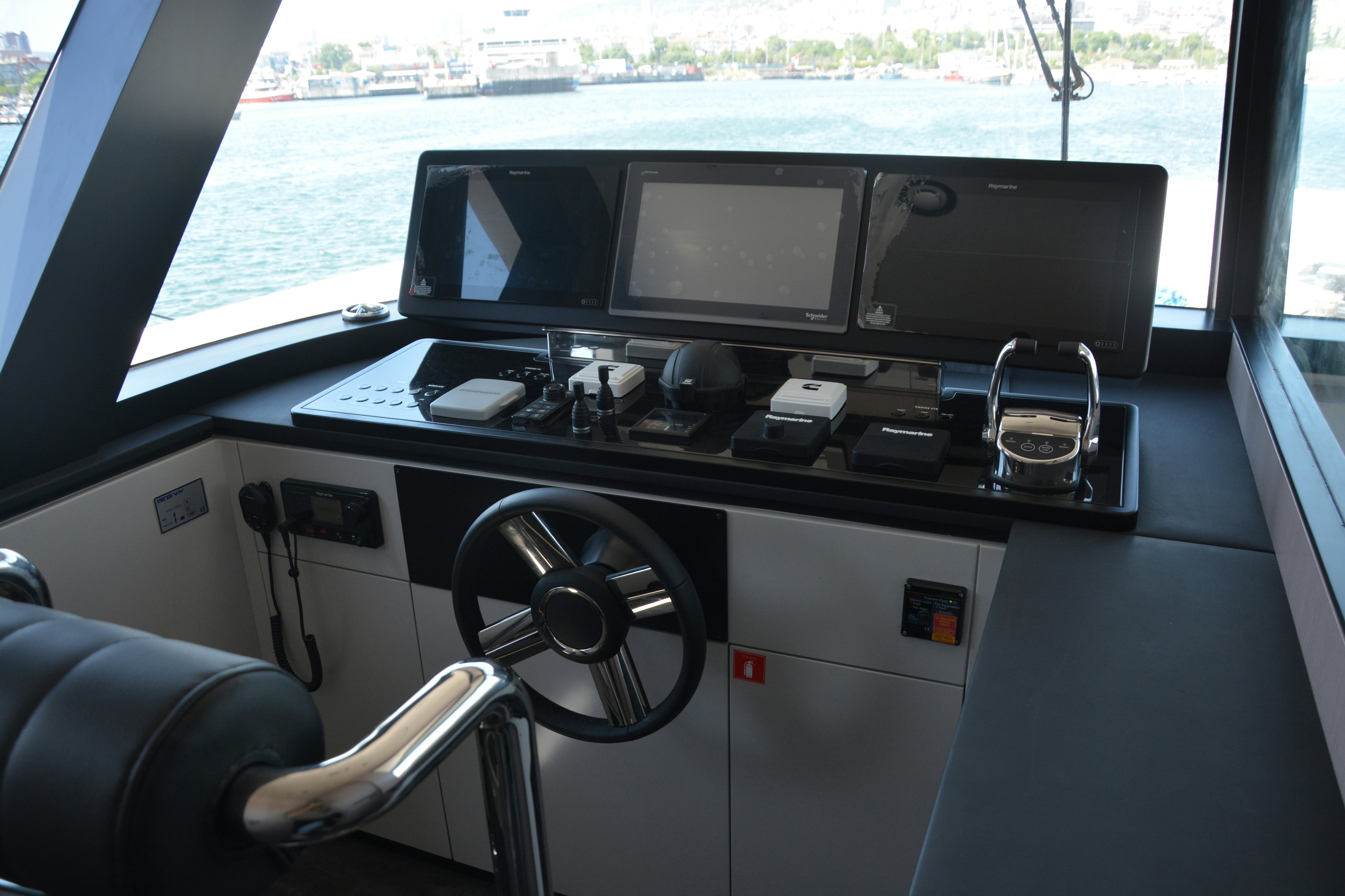 inside of a car aboard ZIMA Yacht for Sale