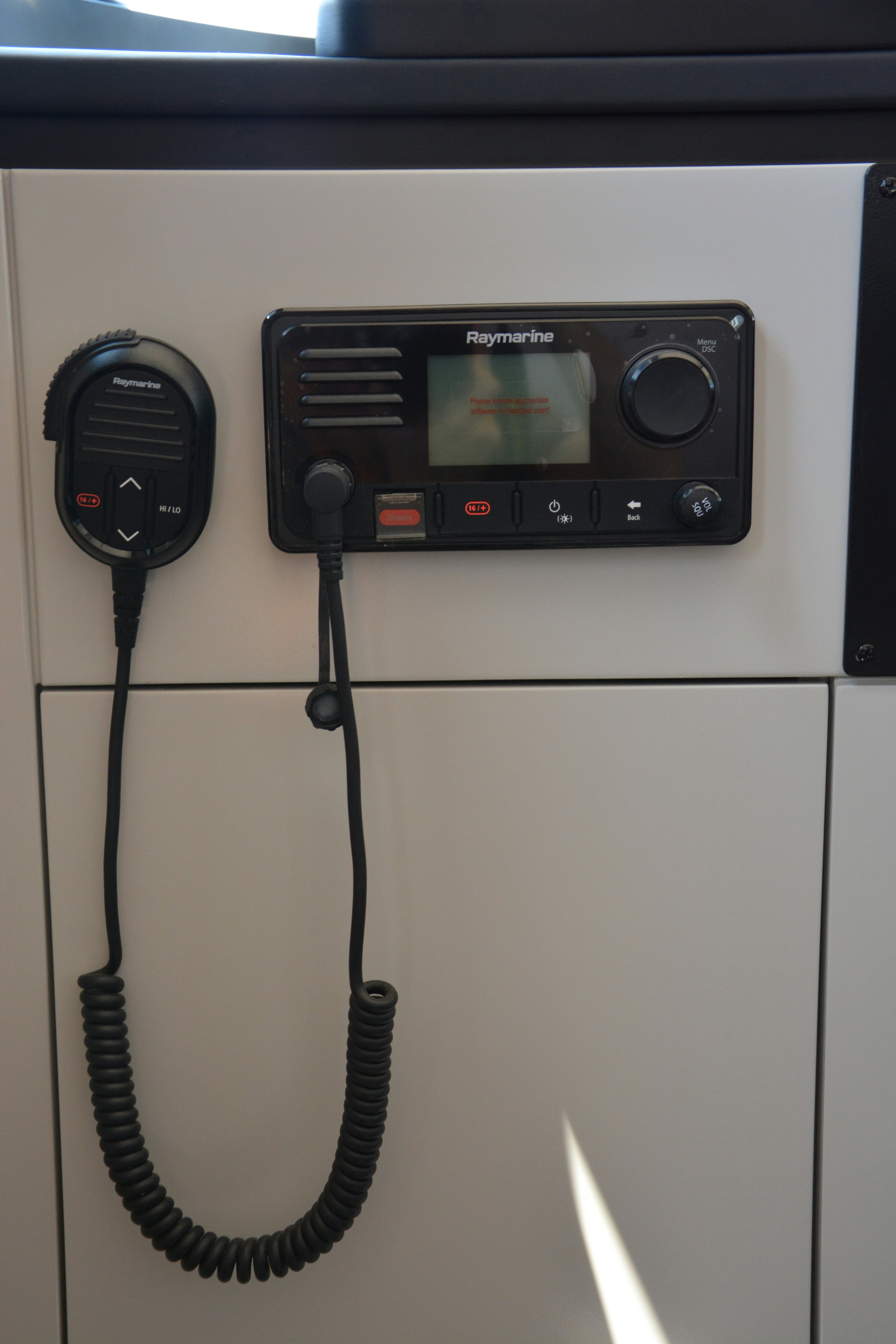 a black electronic device with a wire attached to it aboard ZIMA Yacht for Sale