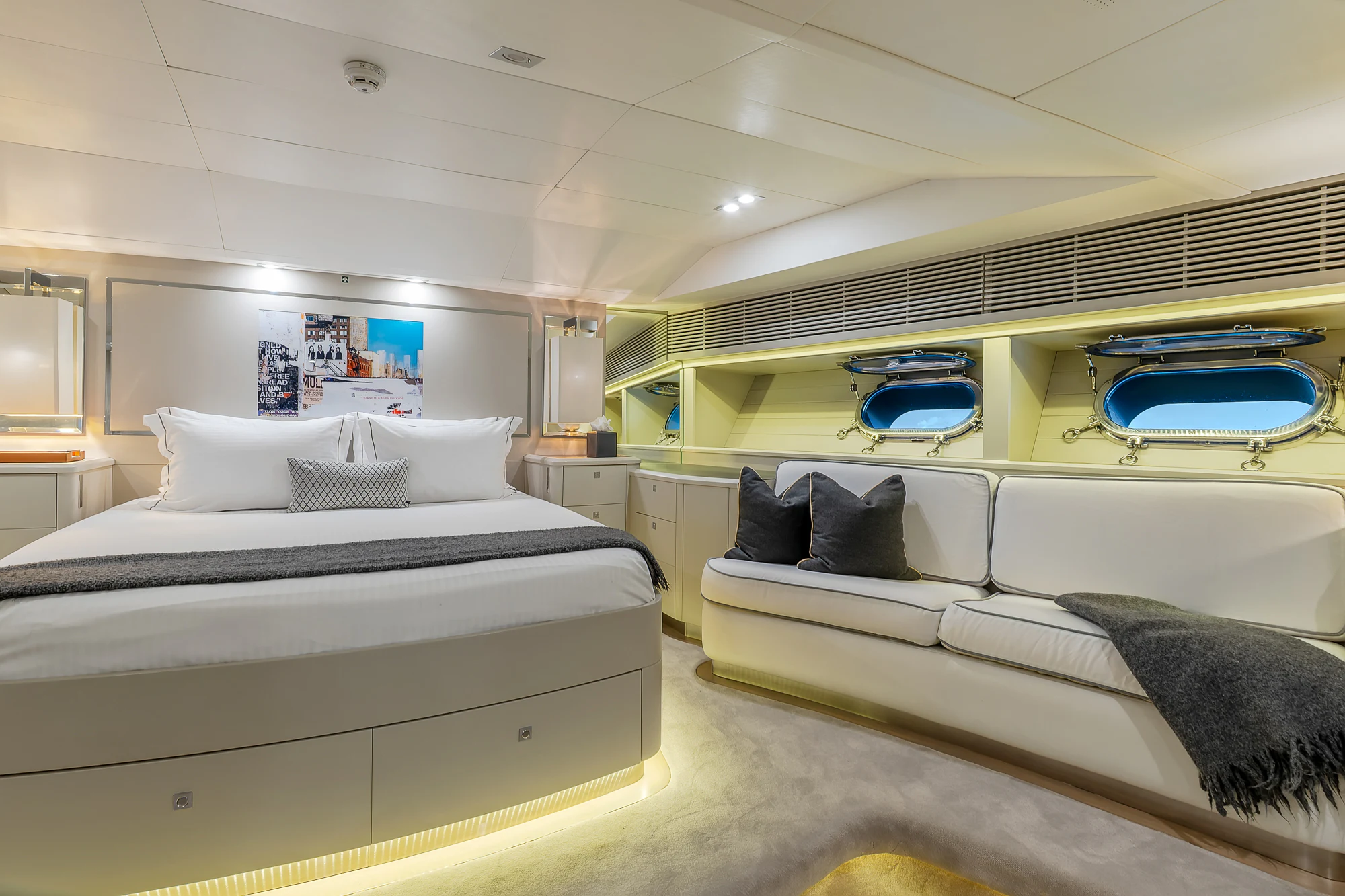 a bedroom with a bed and a couch aboard MY STAR Yacht for Sale