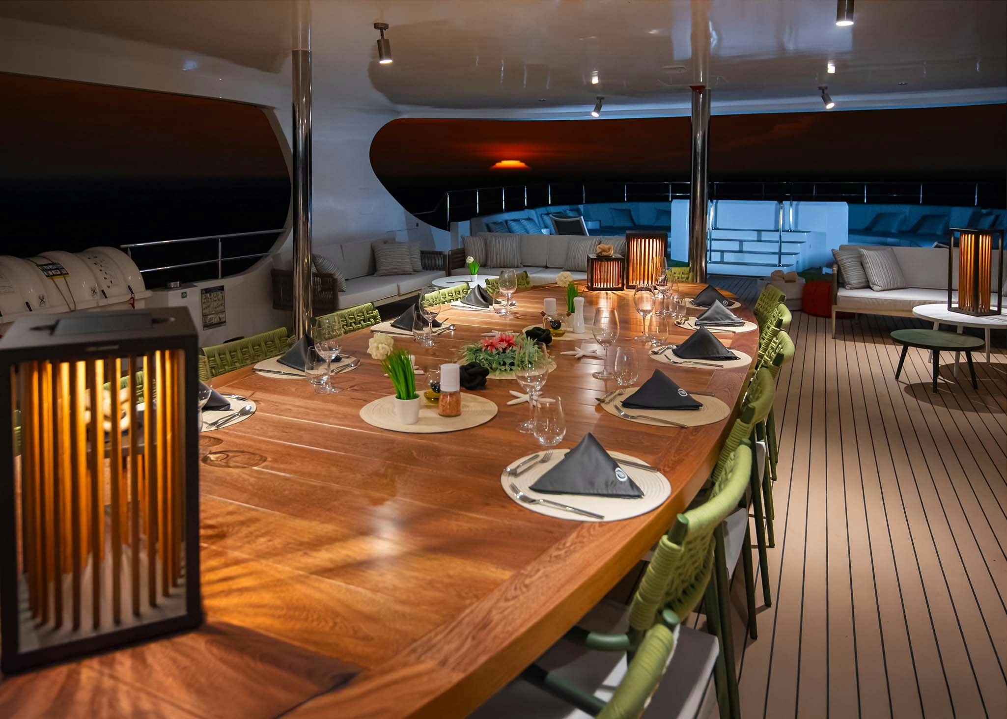 a large table with chairs and a large window overlooking a large city aboard TRIBUTE - FREDDY'S LEGACY Yacht for Charter