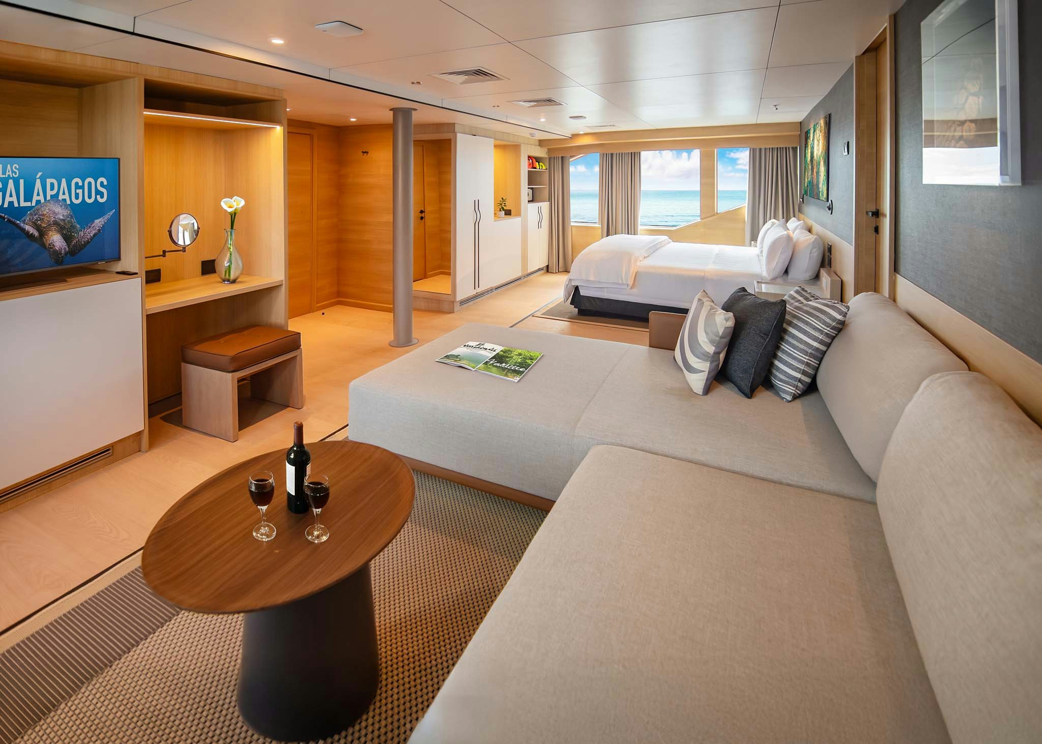 a living room with a couch and a coffee table aboard TRIBUTE - FREDDY'S LEGACY Yacht for Charter