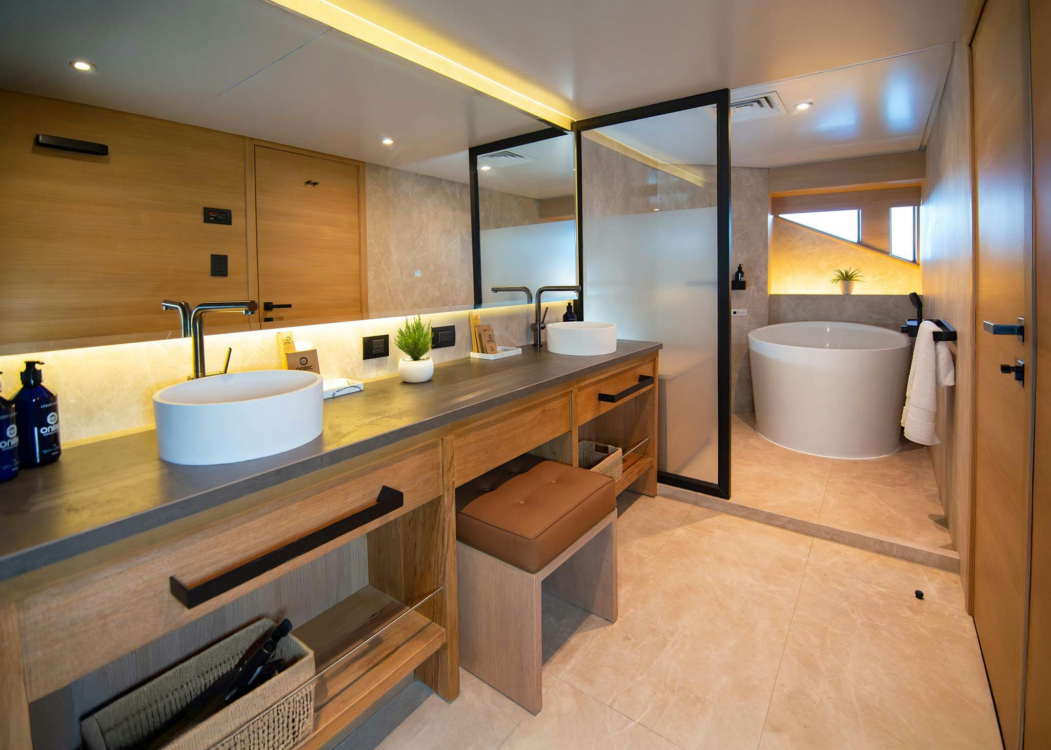 a bathroom with a large mirror aboard TRIBUTE - FREDDY'S LEGACY Yacht for Charter