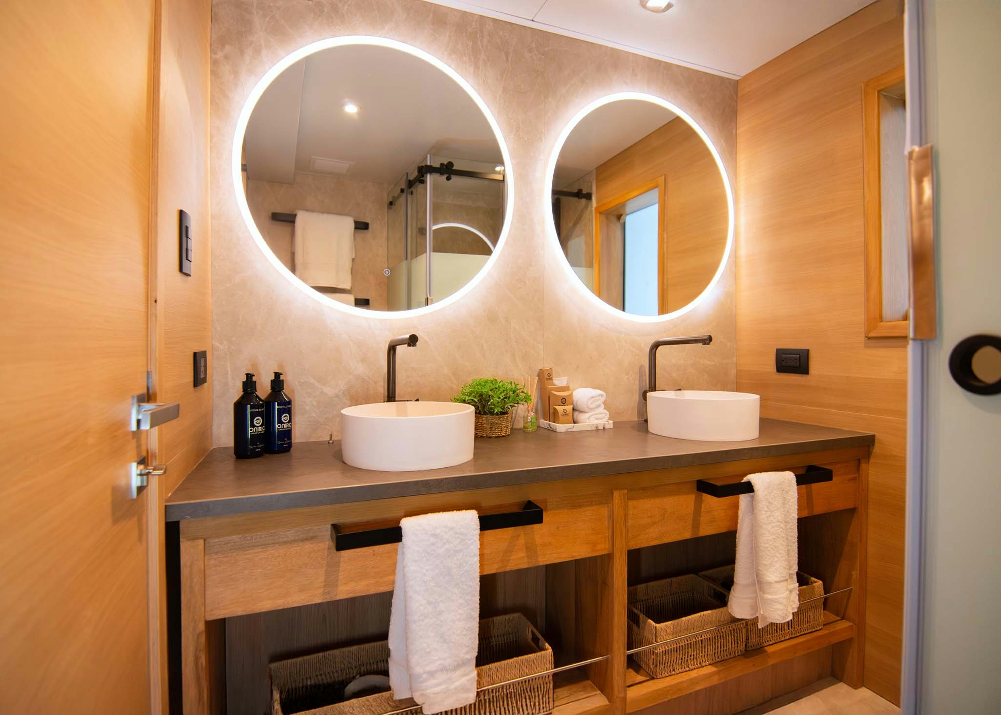 a bathroom with a large mirror aboard TRIBUTE - FREDDY'S LEGACY Yacht for Charter