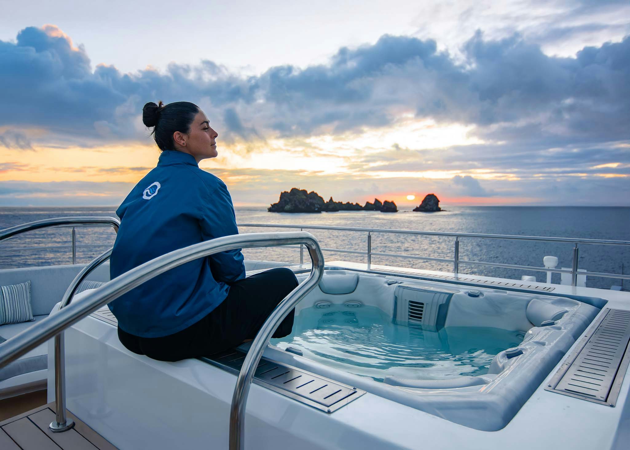 a person sitting on a boat aboard TRIBUTE - FREDDY'S LEGACY Yacht for Charter
