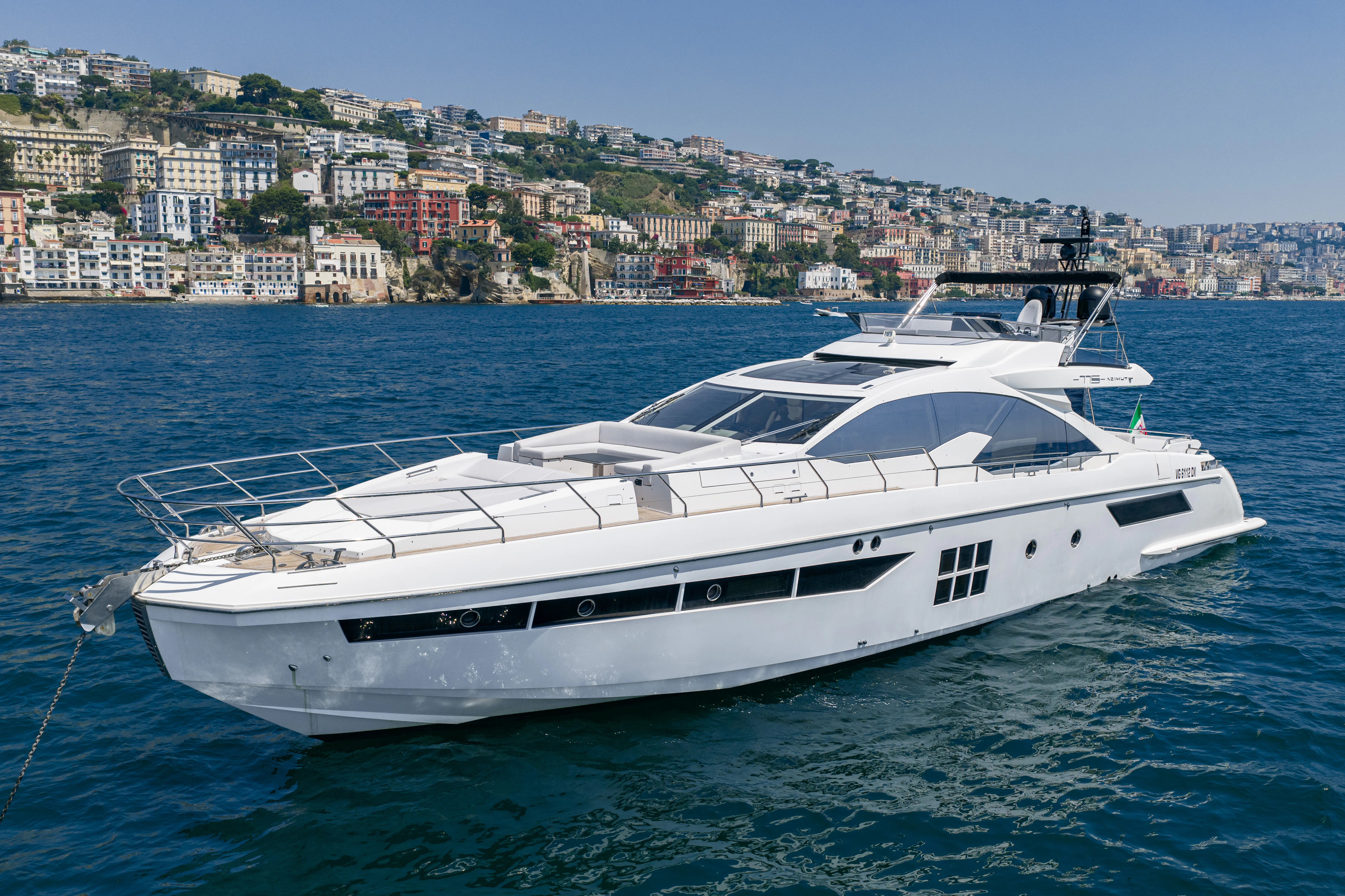 a white yacht in the water aboard JR 28 Yacht for Sale