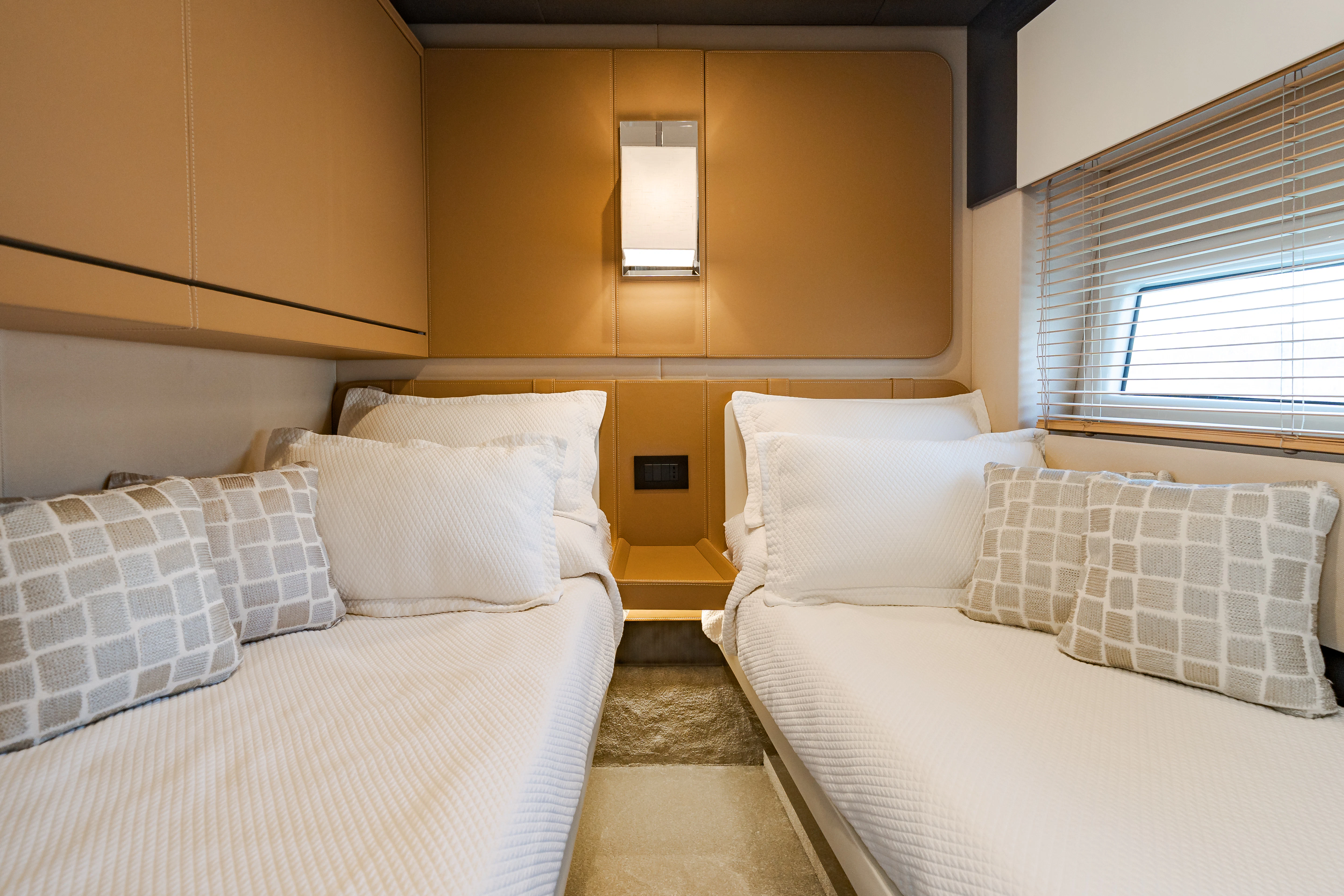a room with two beds aboard JR 28 Yacht for Sale