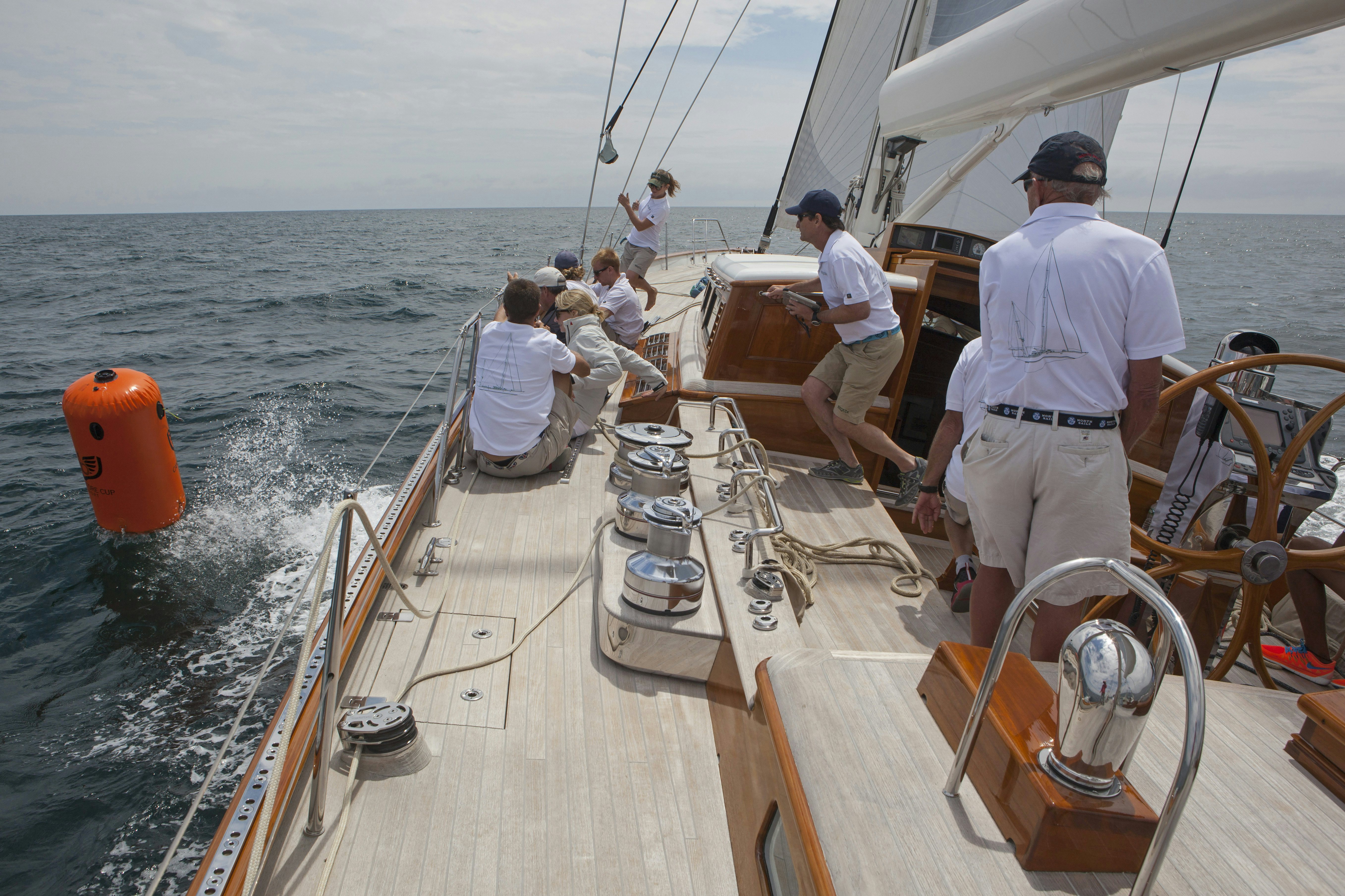 a group of people on a boat aboard BEQUIA Yacht for Sale