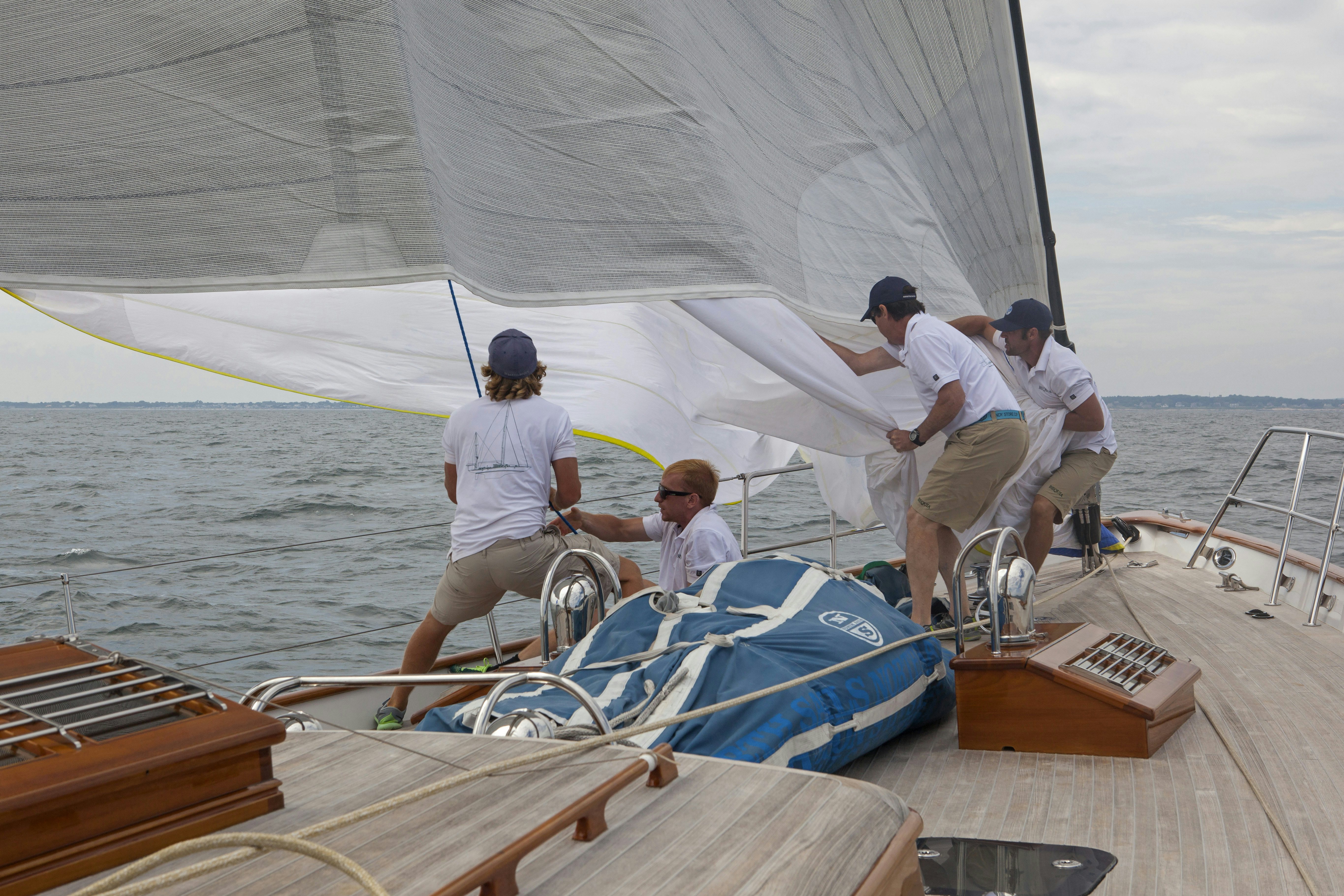 a group of people on a boat aboard BEQUIA Yacht for Sale
