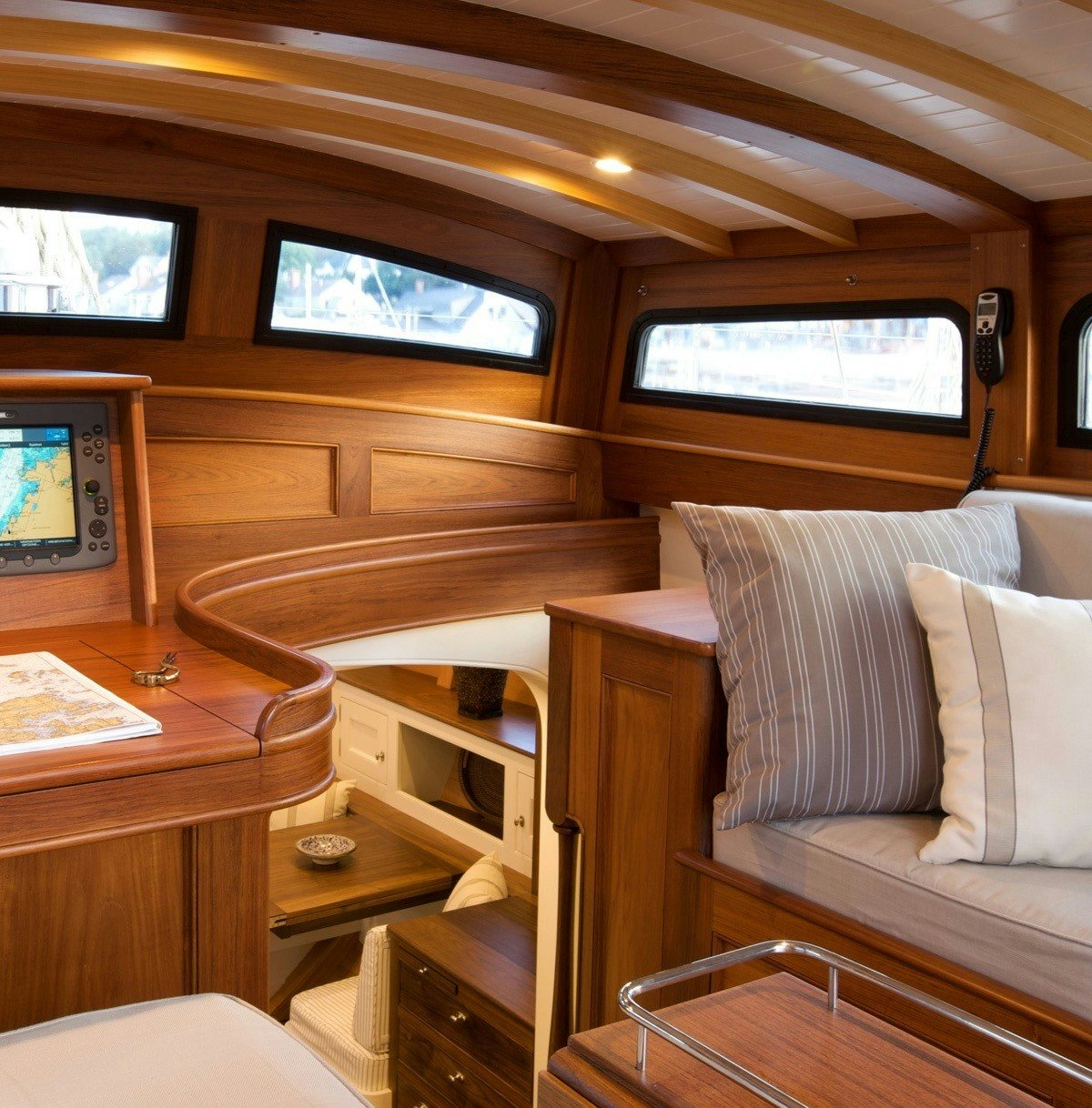 a room with a couch and a television aboard BEQUIA Yacht for Sale