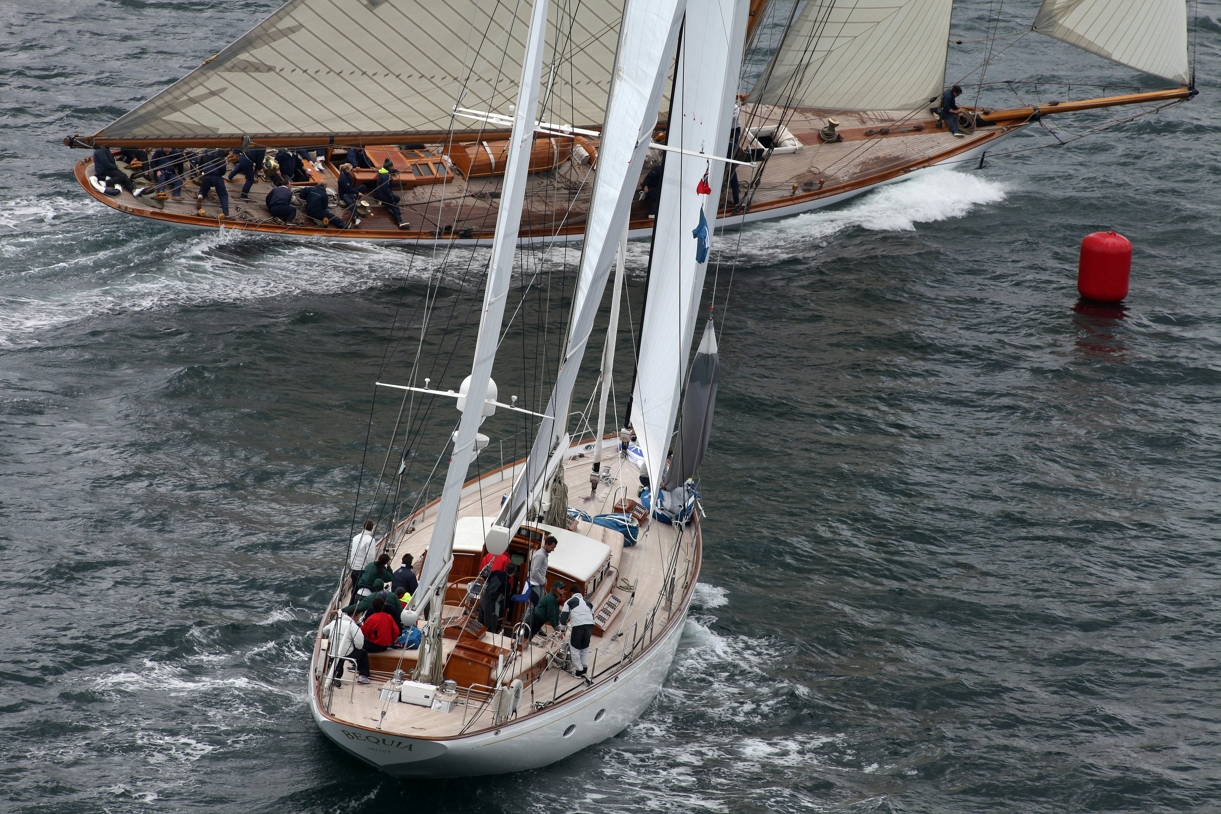 a group of people sailing on a boat aboard BEQUIA Yacht for Sale