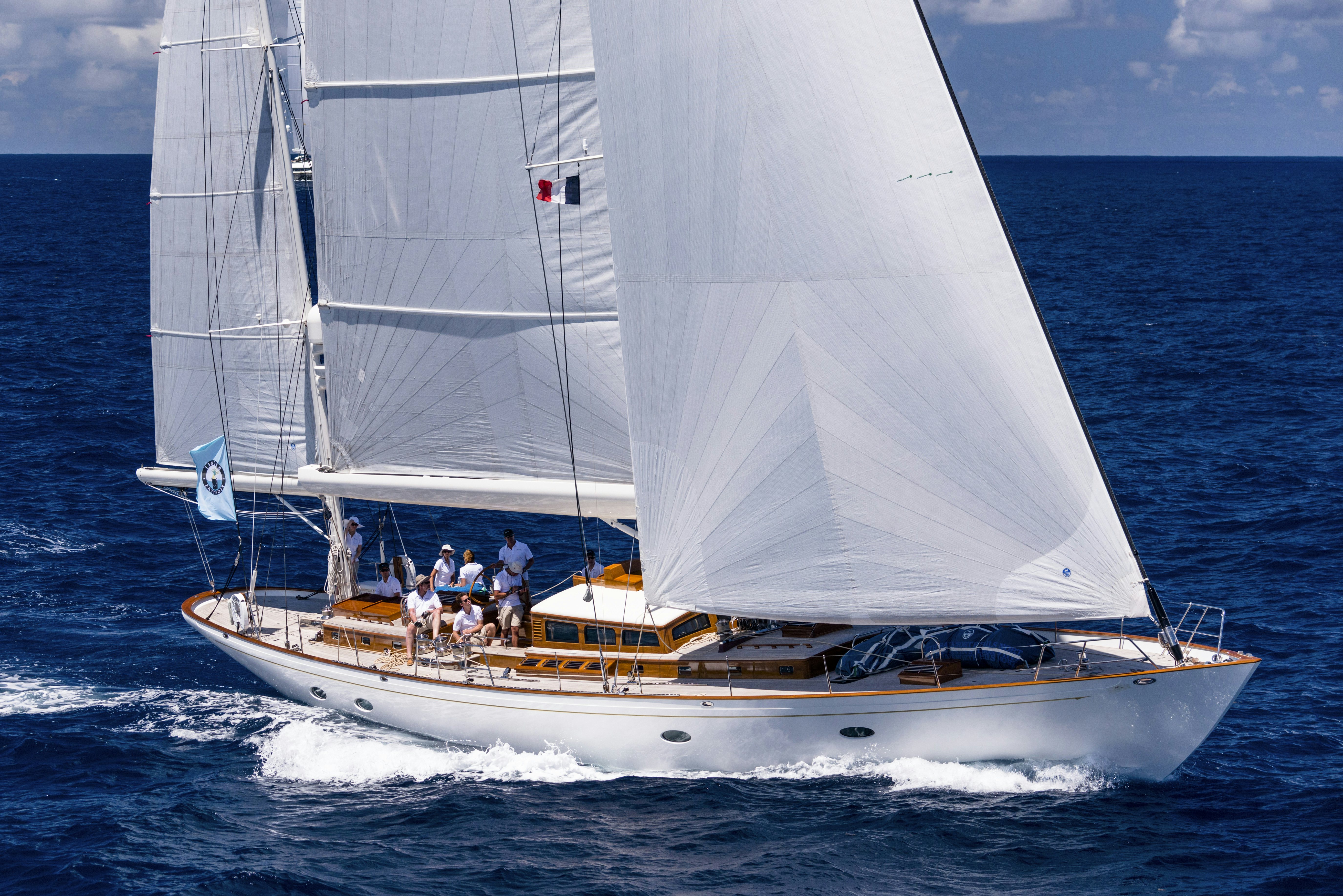 a boat with people on it aboard BEQUIA Yacht for Sale