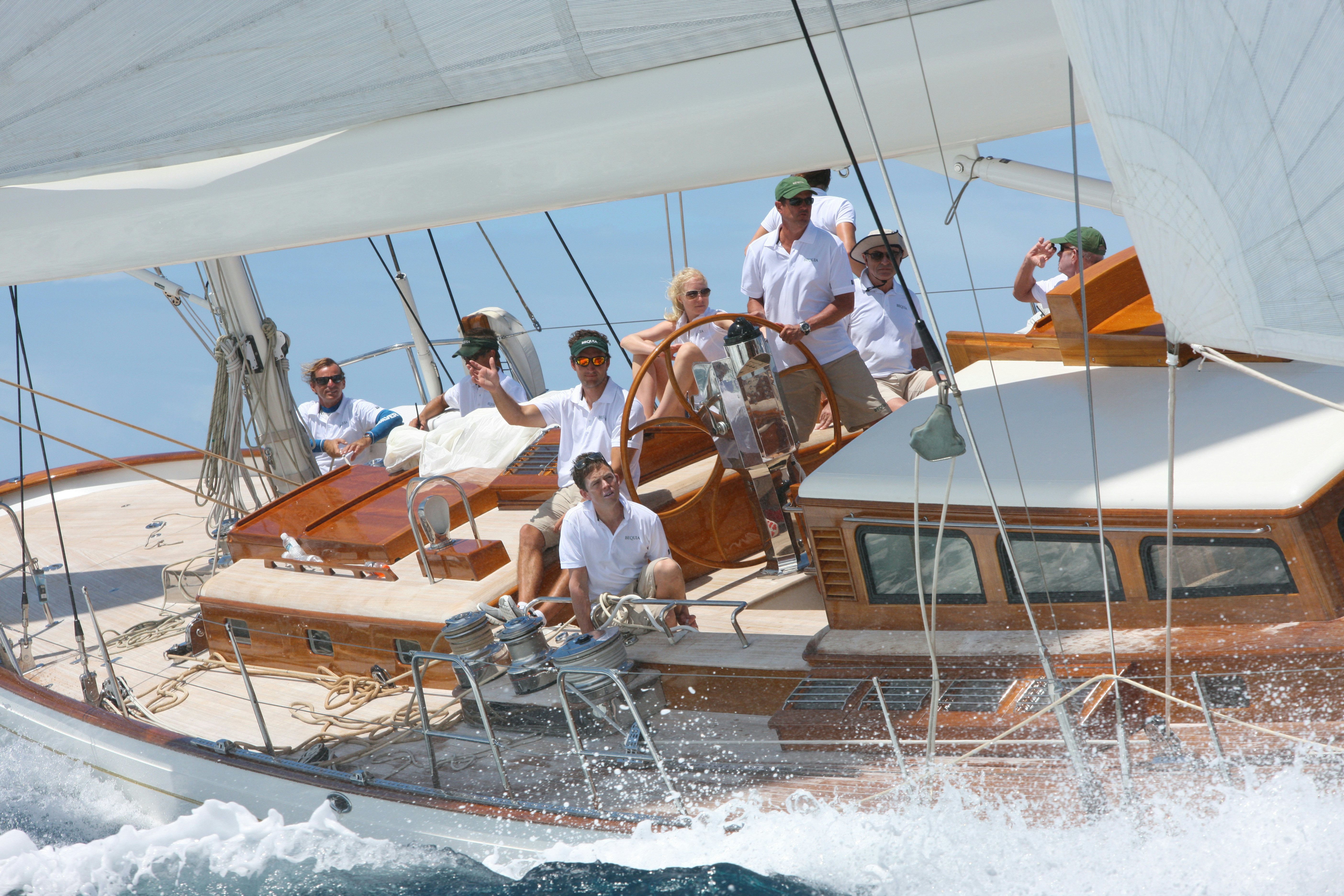 a group of people on a boat aboard BEQUIA Yacht for Sale