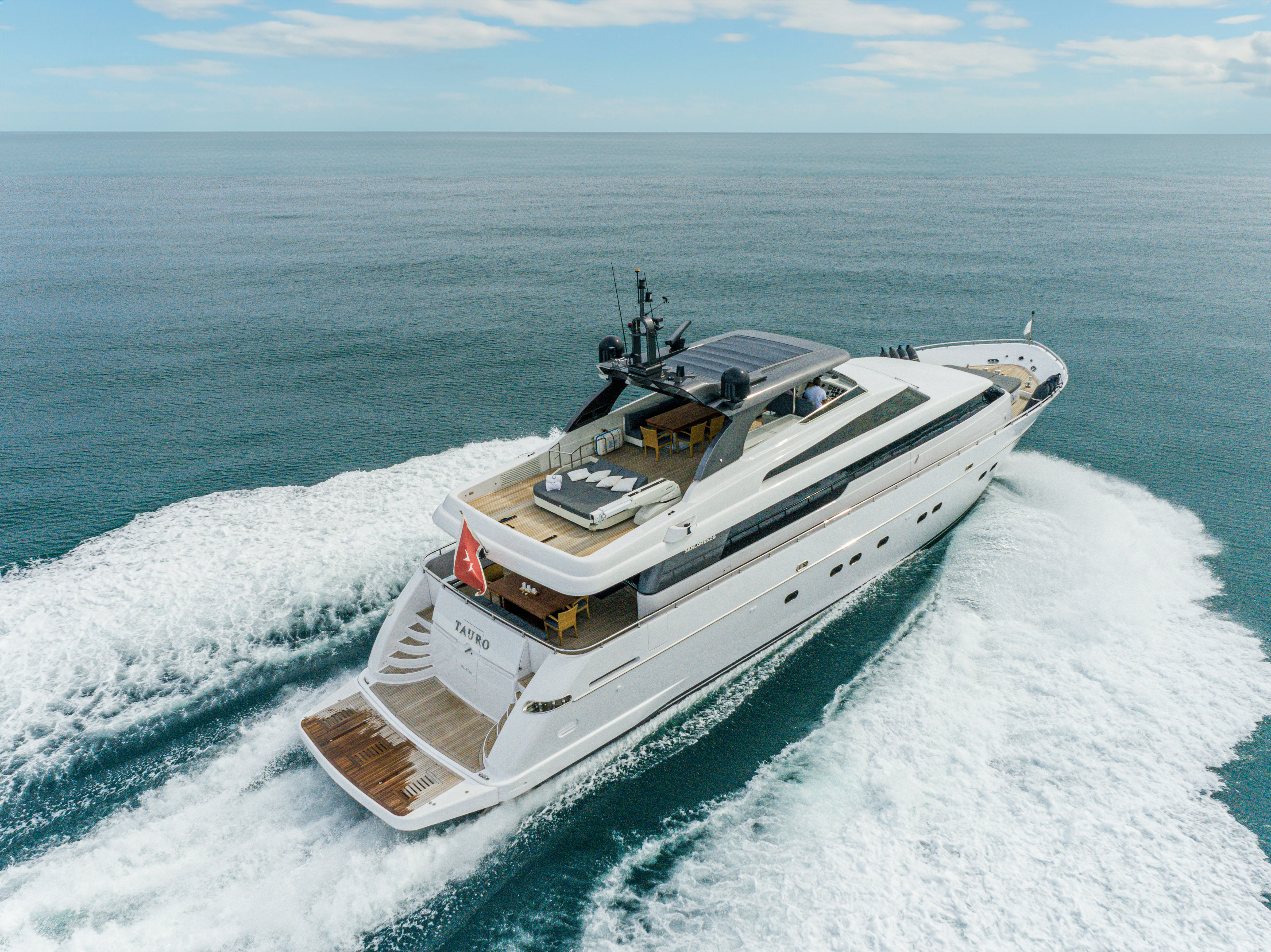 a military ship on the water aboard TAURO Yacht for Sale