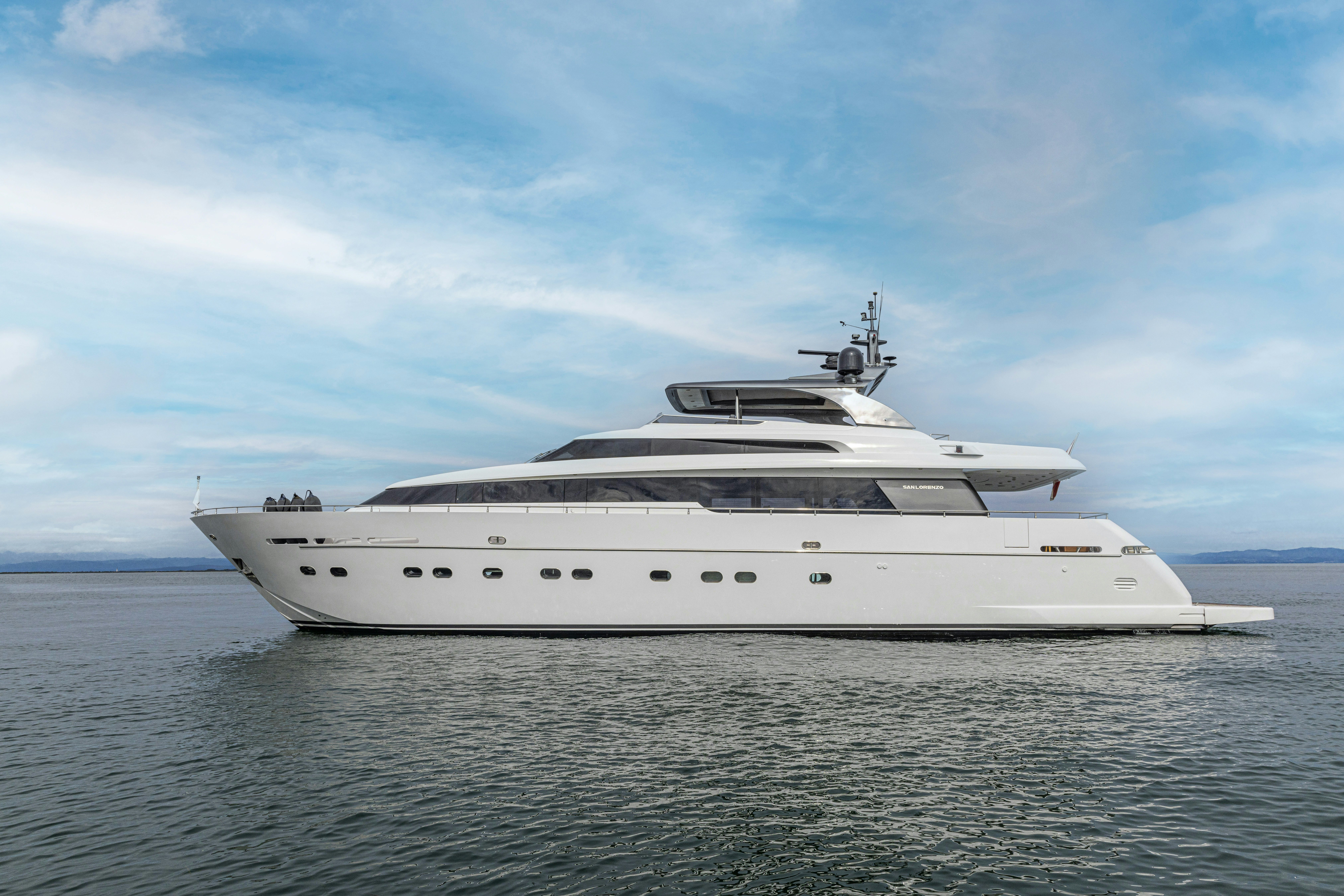 a white yacht in the water aboard TAURO Yacht for Sale