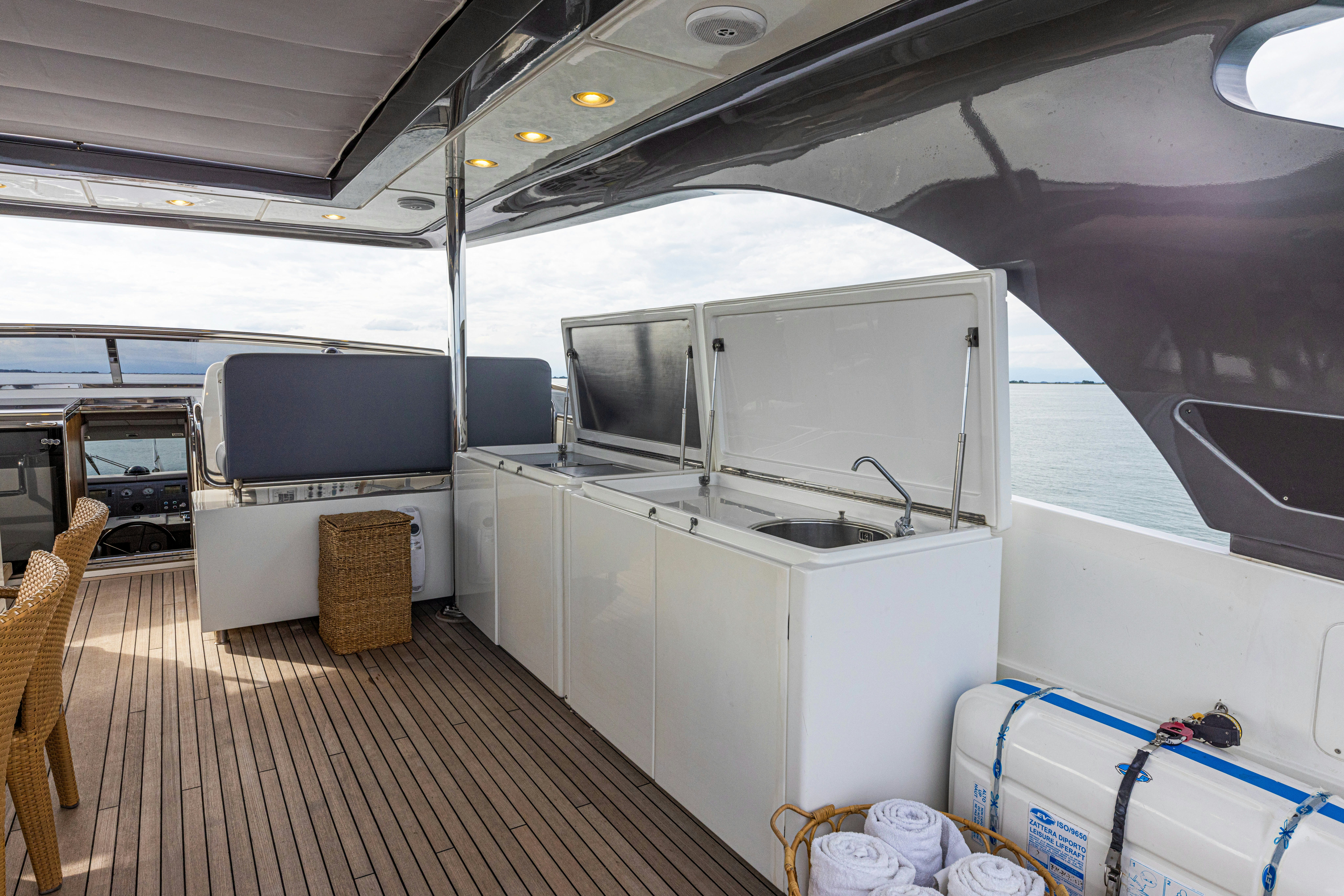 a boat with a large tv aboard TAURO Yacht for Sale
