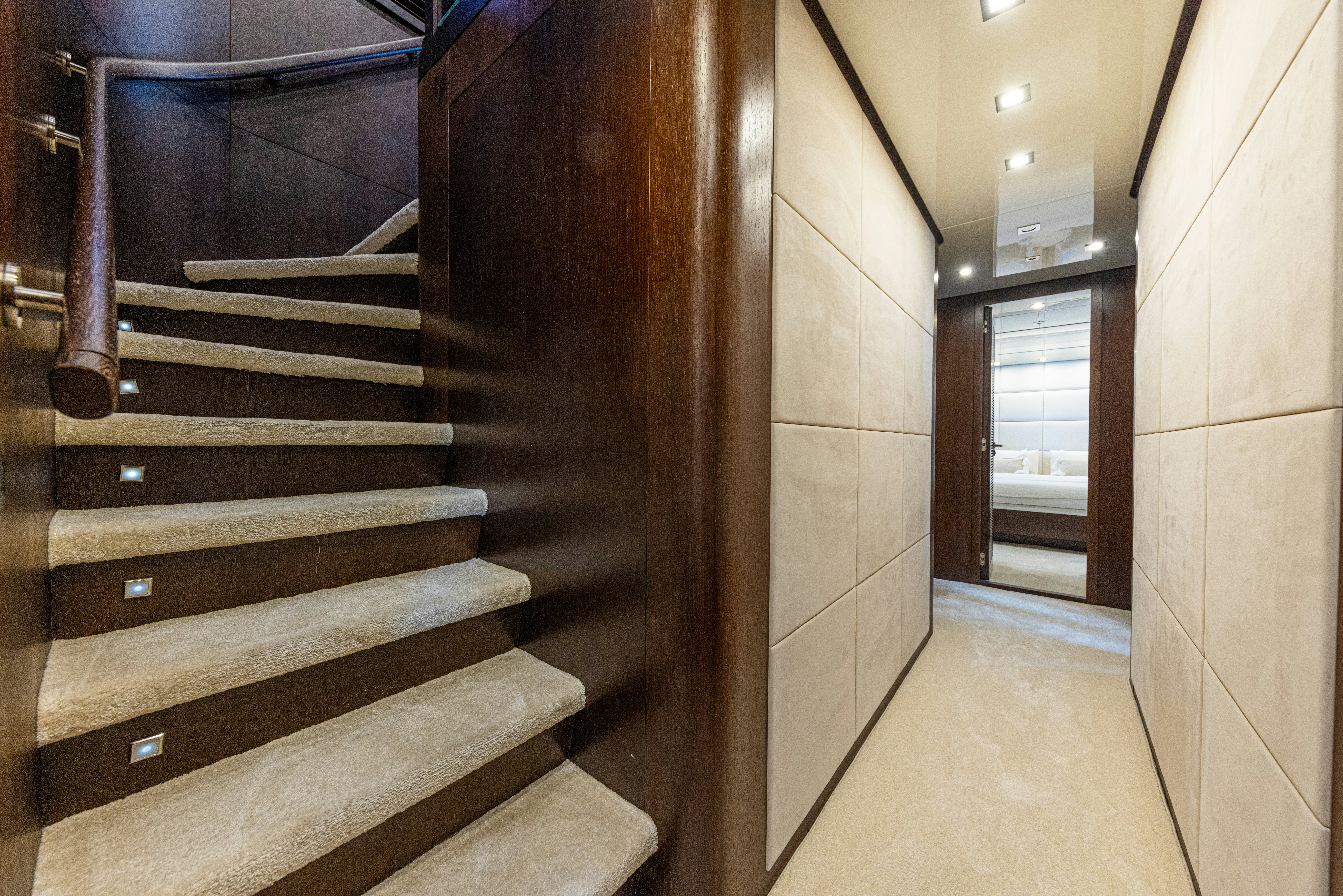 a staircase in a building aboard TAURO Yacht for Sale