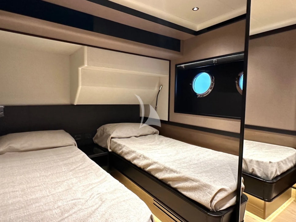 a couple of beds in a room aboard SEMELA Yacht for Charter