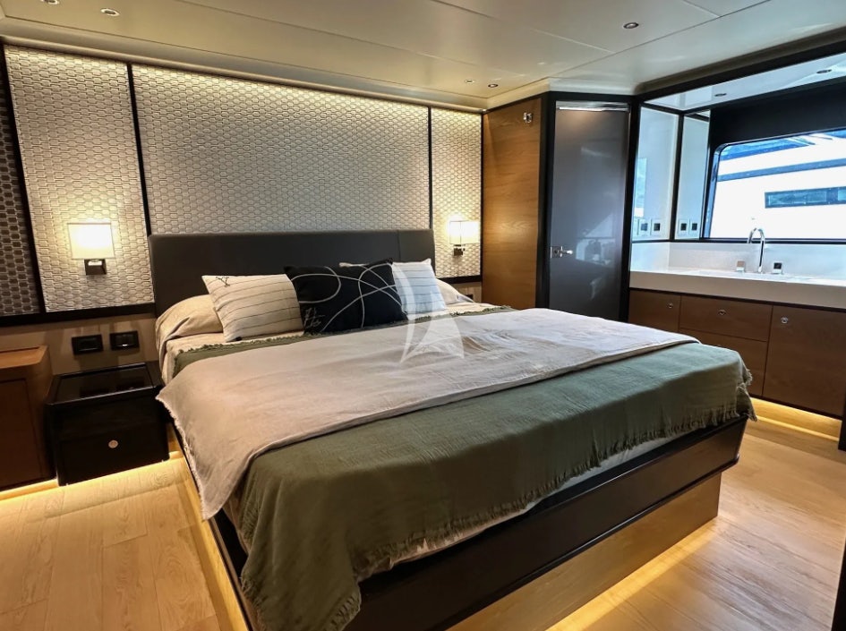 a large bed in a room aboard SEMELA Yacht for Charter