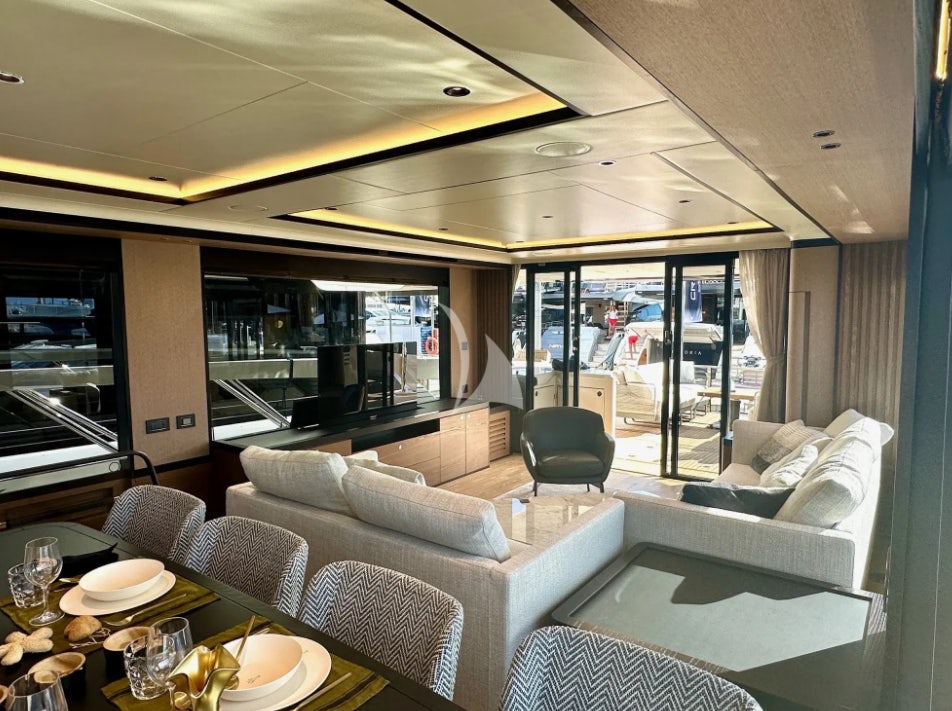 a living room with a large window aboard SEMELA Yacht for Charter