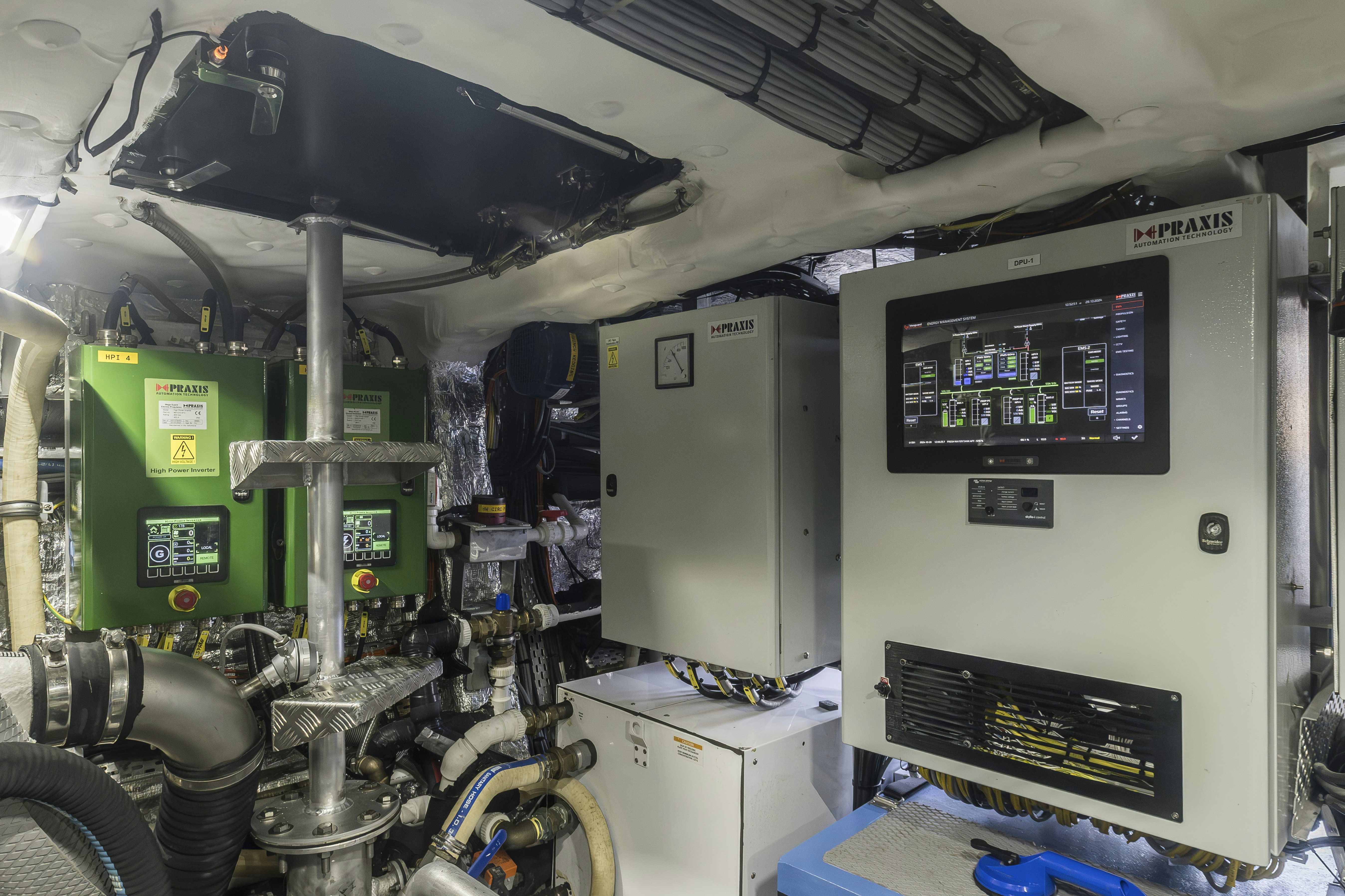 a machine with a large piece of equipment in it aboard VANGUARD Yacht for Sale