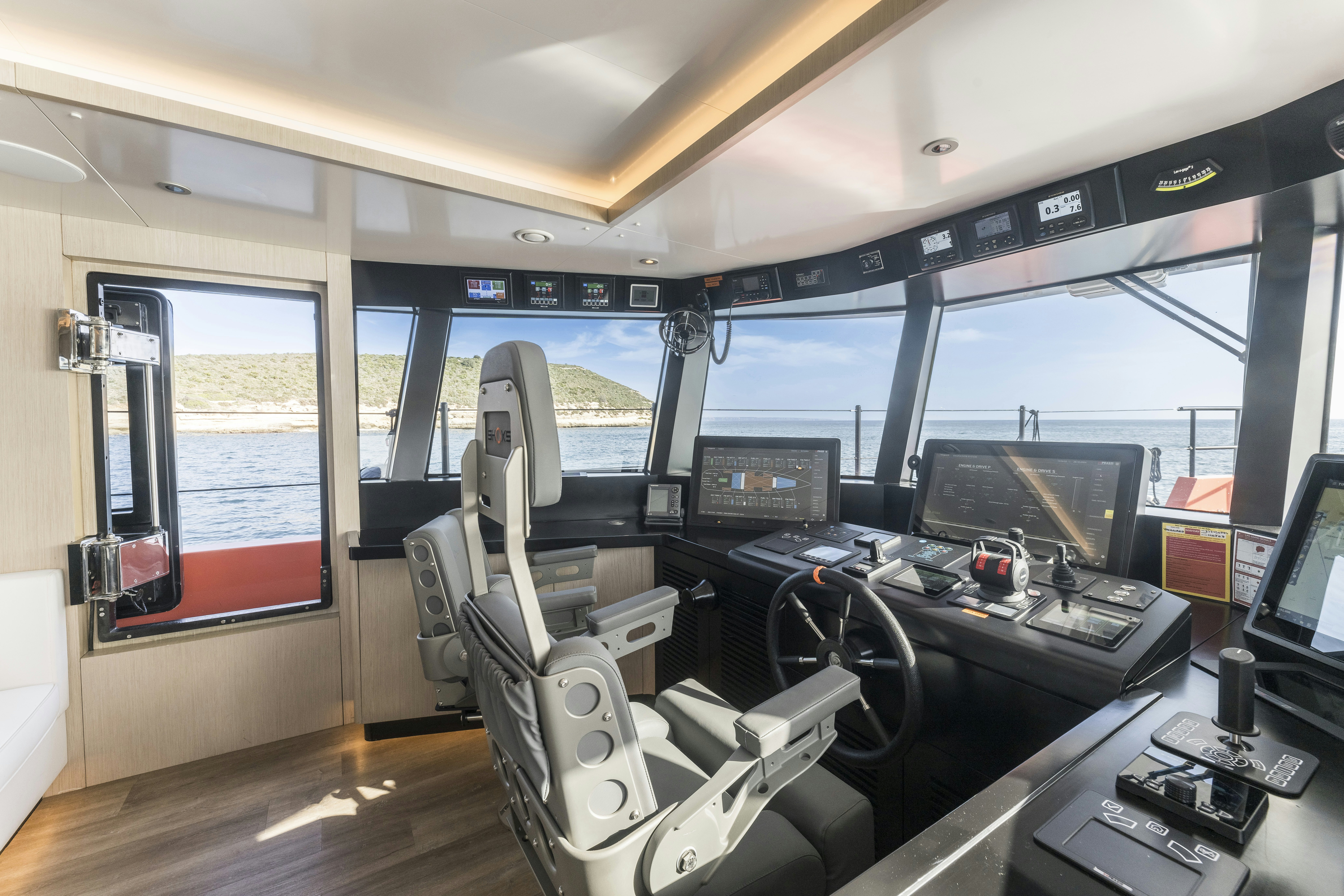 inside of a vehicle with many computers aboard VANGUARD Yacht for Sale