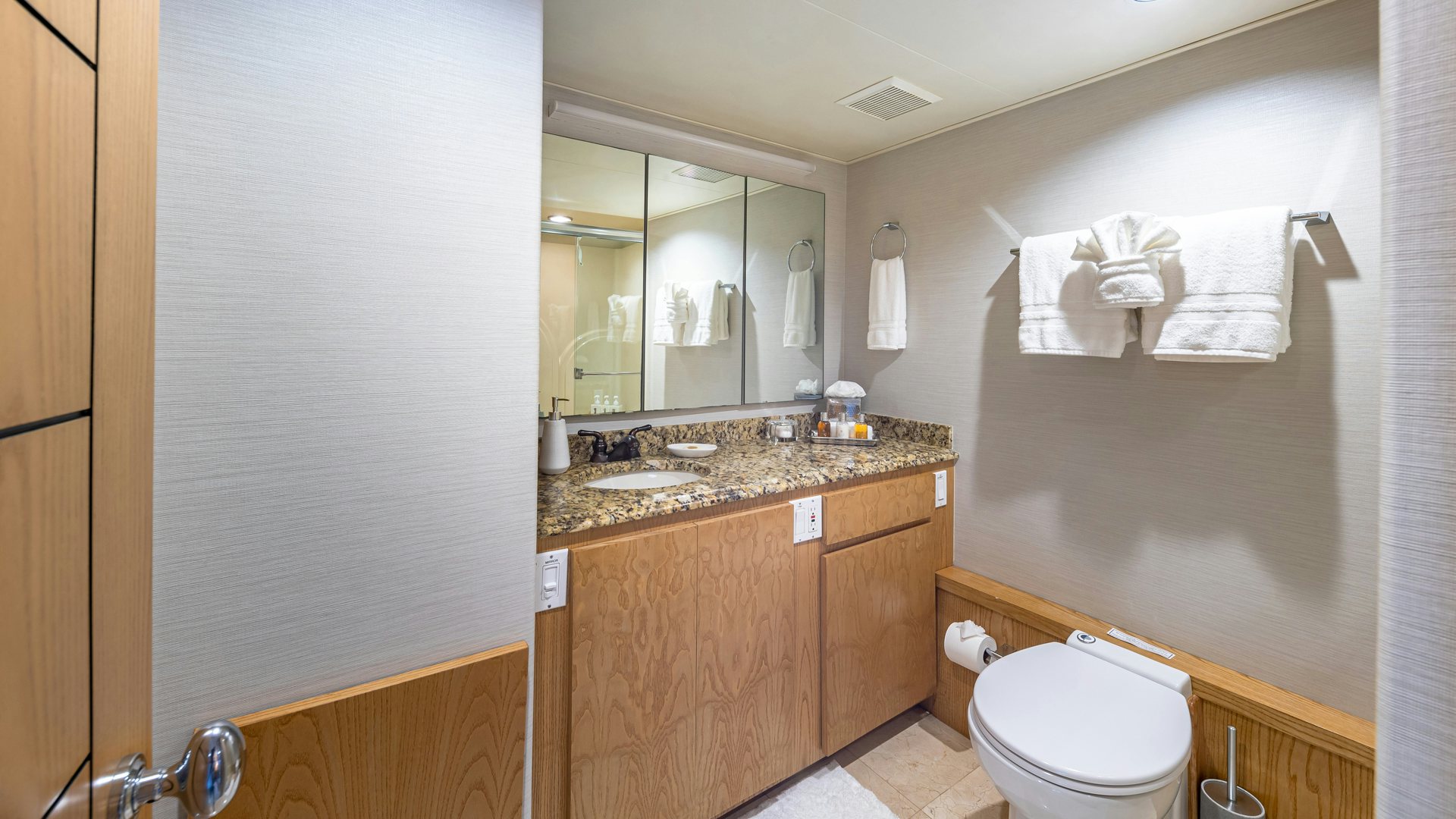 a bathroom with a sink and a toilet aboard MARGATE Yacht for Sale