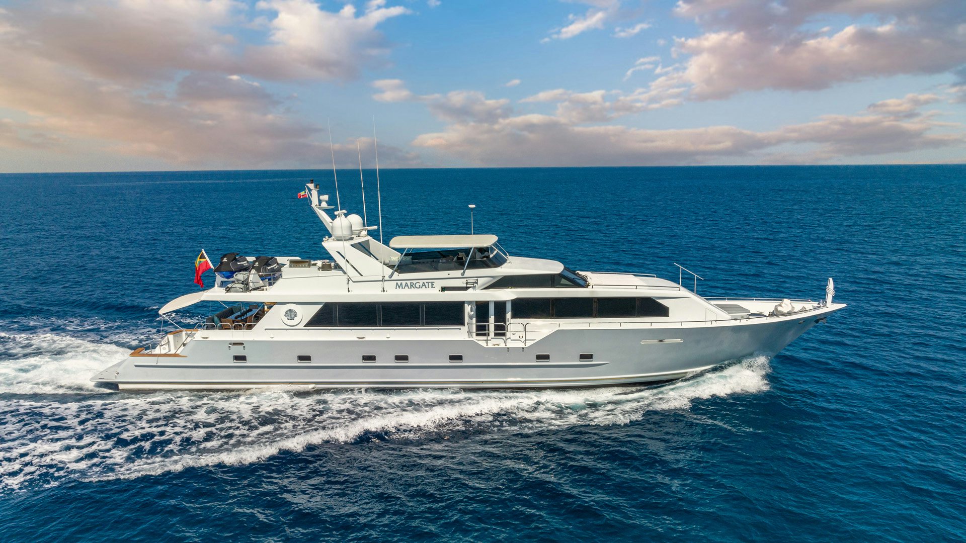 a white boat on the water aboard MARGATE Yacht for Sale