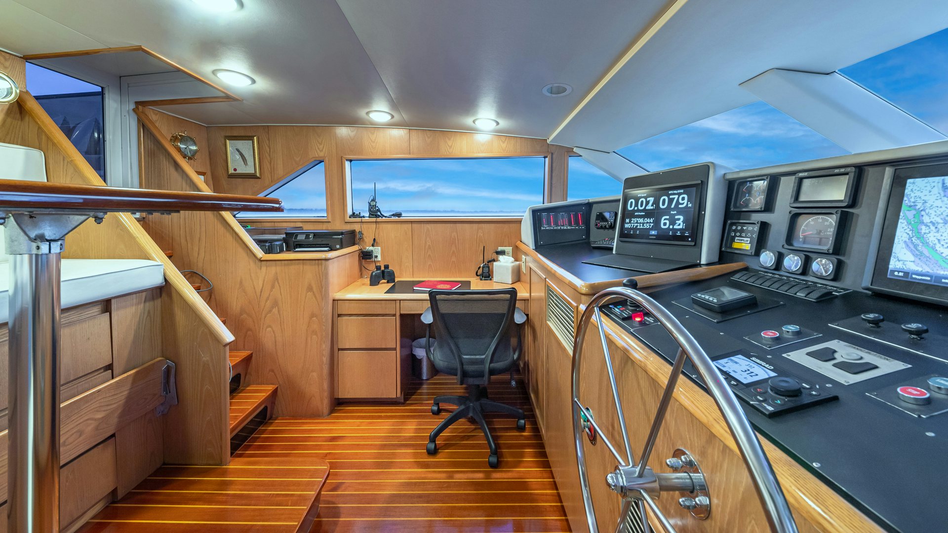 a room with a desk and computer aboard MARGATE Yacht for Sale