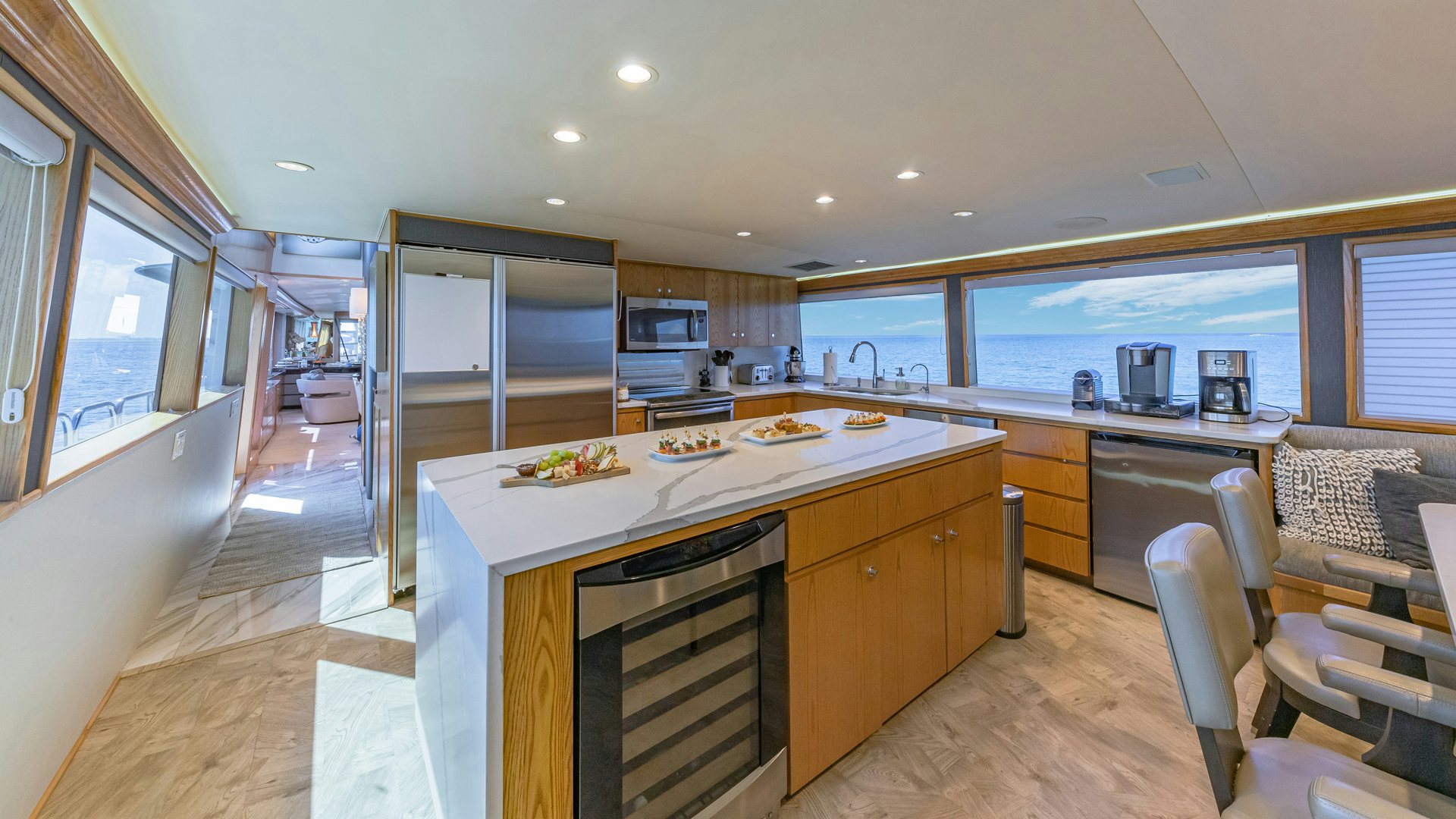 a kitchen with a large island aboard MARGATE Yacht for Sale