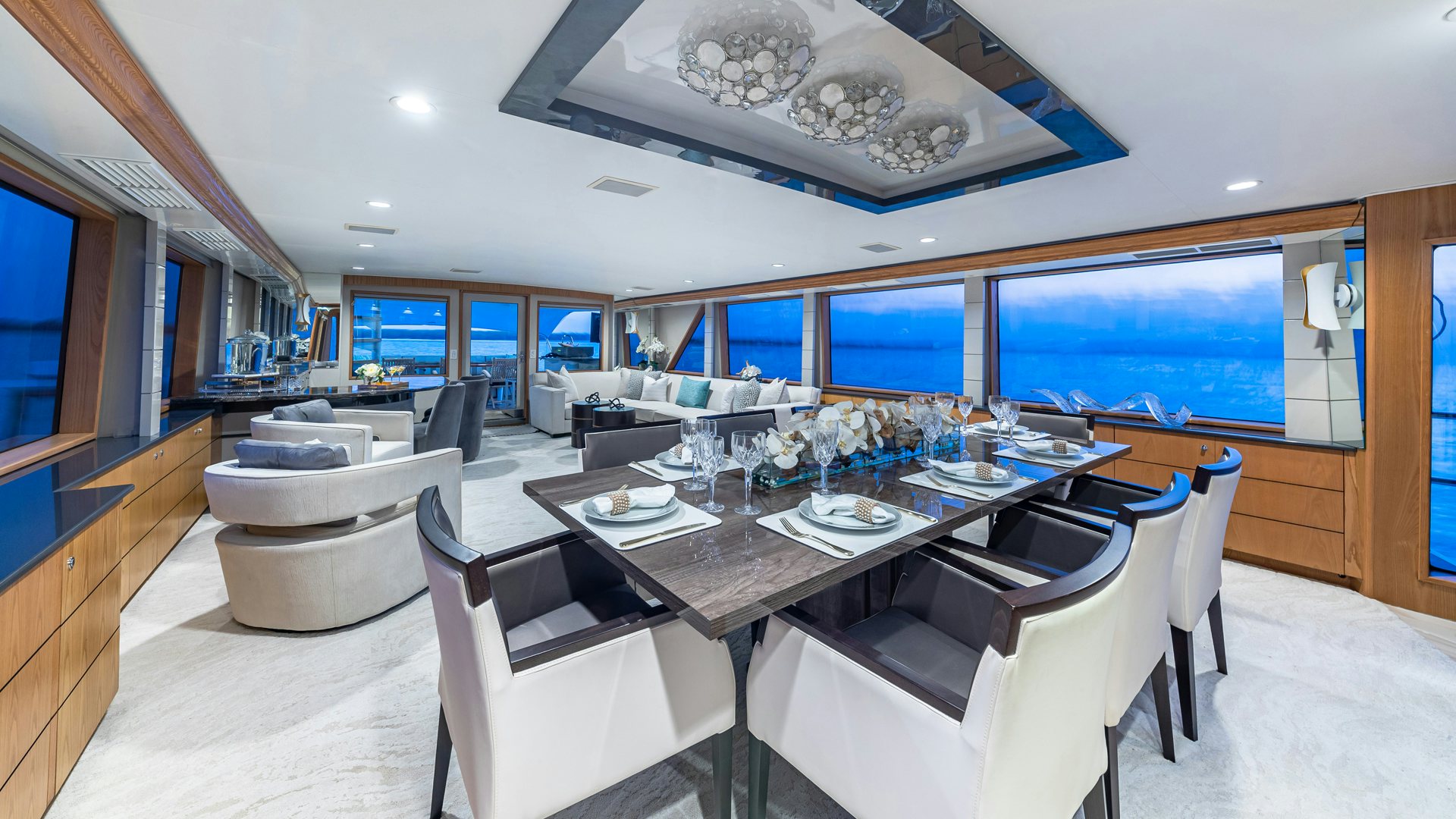 a dining room with a large table aboard MARGATE Yacht for Sale