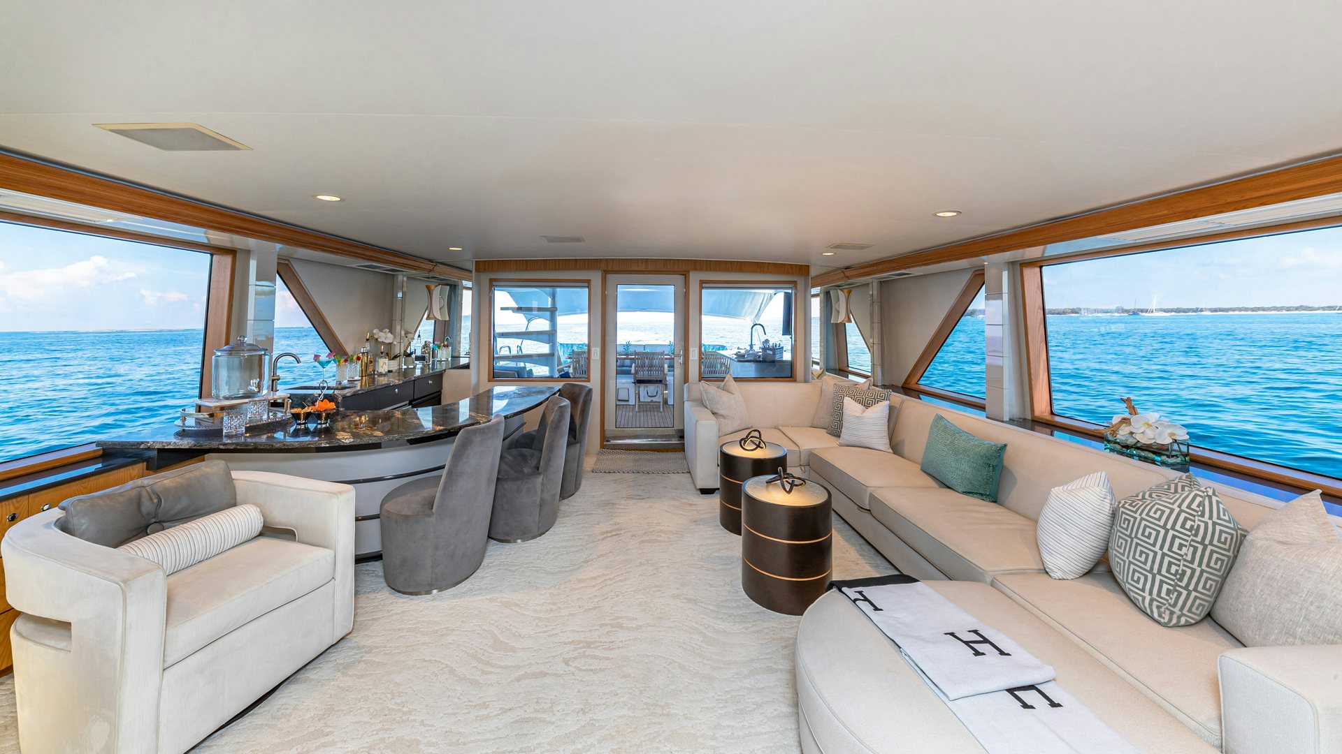 a living room with a large window aboard MARGATE Yacht for Sale