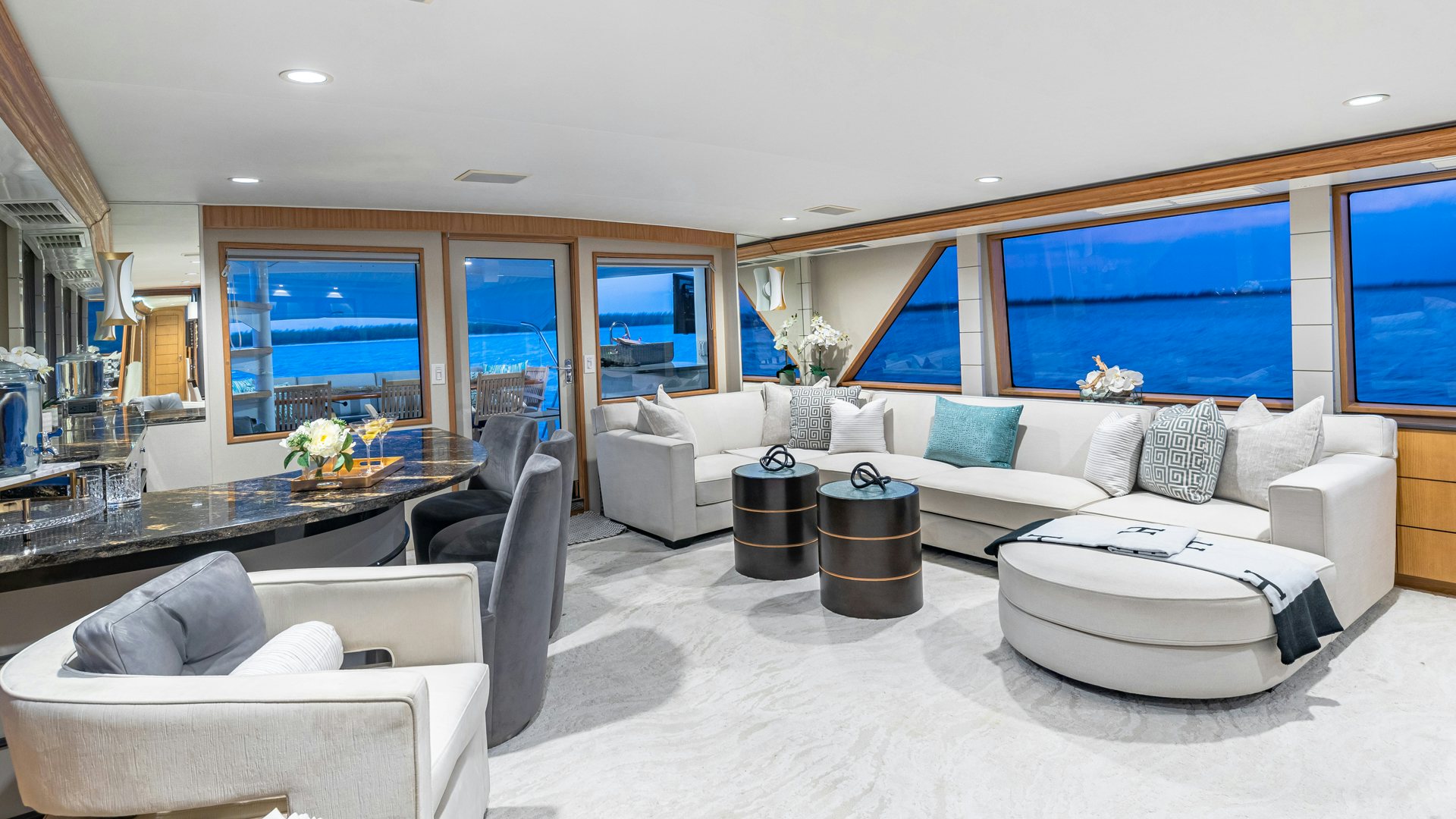 a living room with a large window aboard MARGATE Yacht for Sale