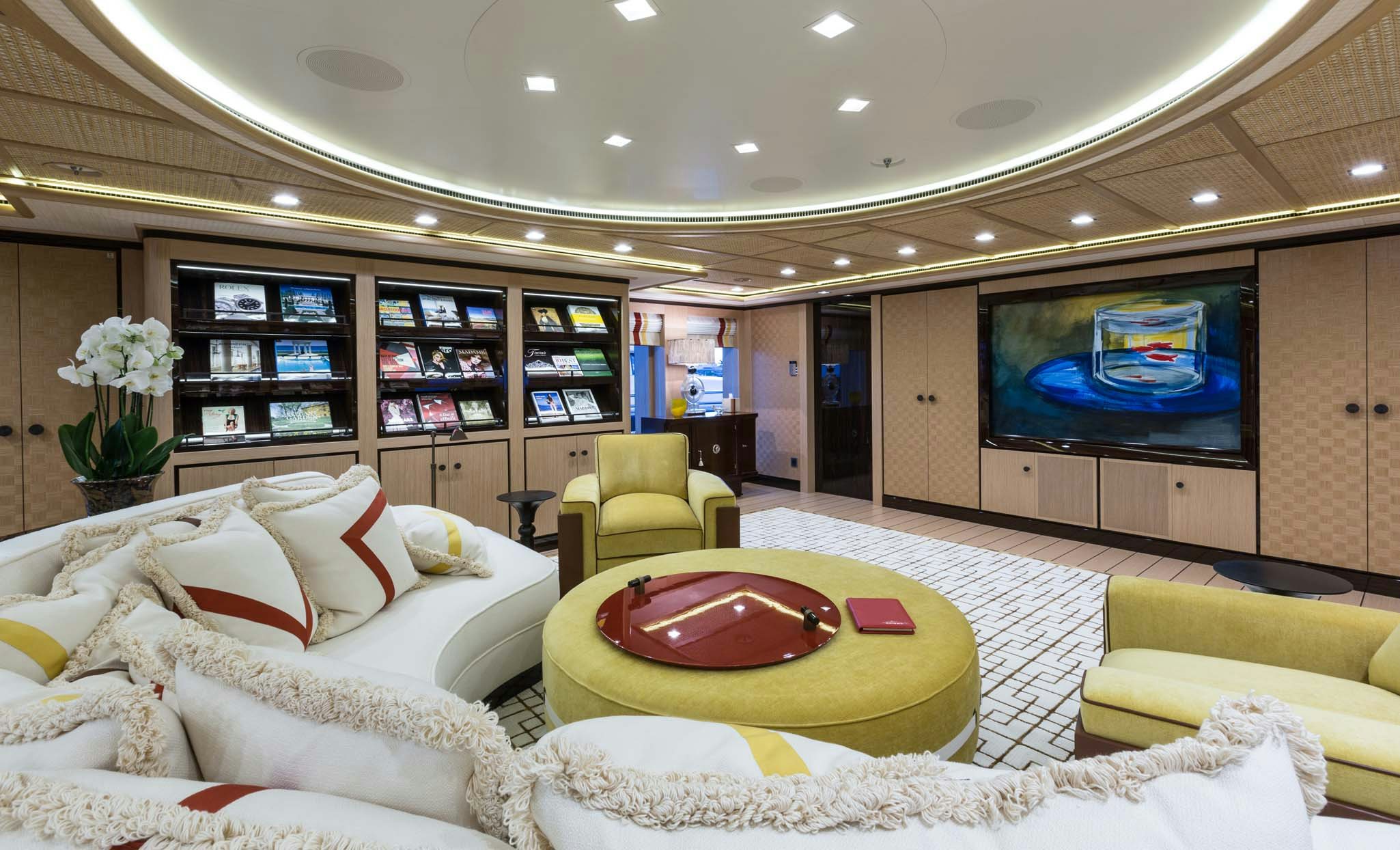 a living room with a fireplace aboard AXIOMA Yacht for Charter