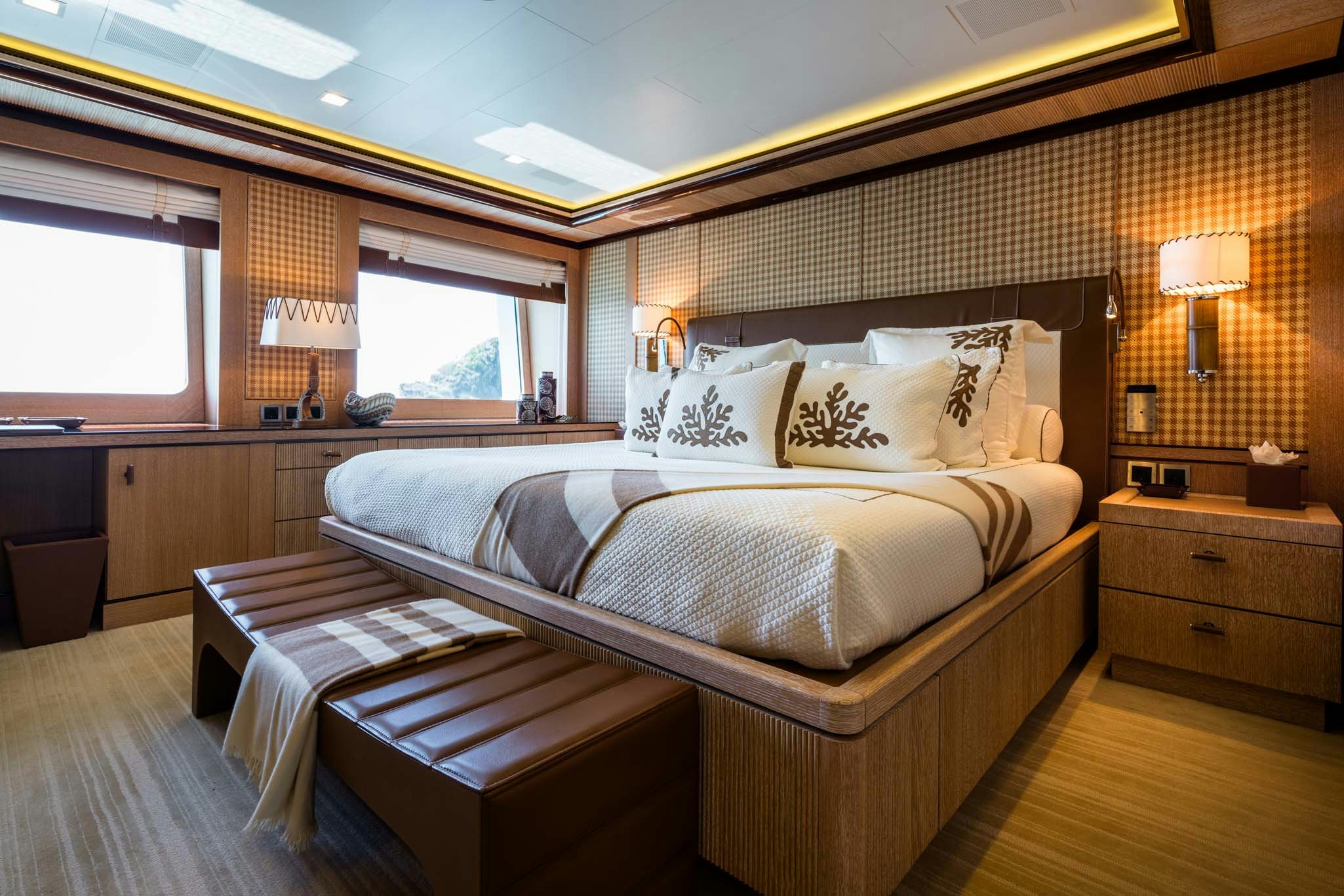 a bedroom with a large bed aboard AXIOMA Yacht for Charter