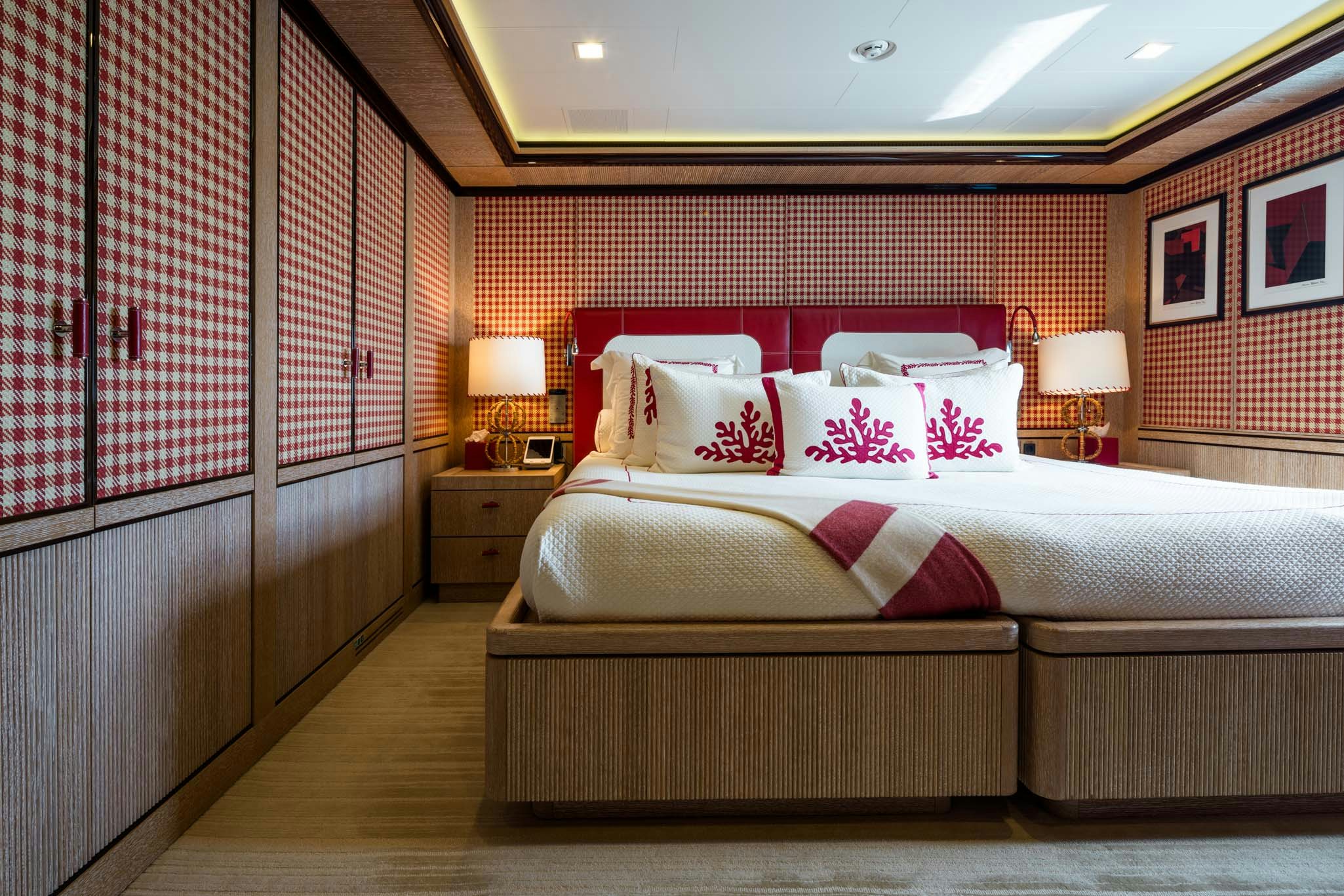 a bed in a room aboard AXIOMA Yacht for Charter