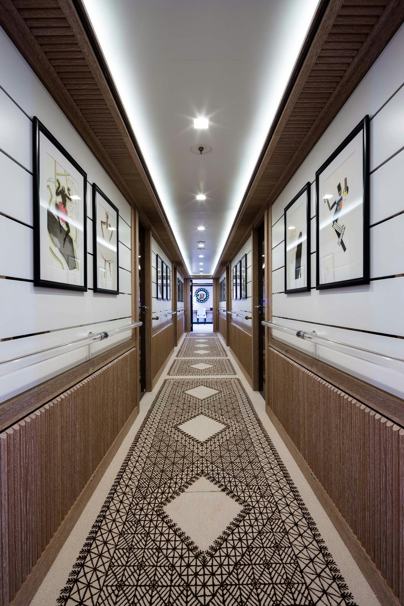 a hallway with a large window aboard AXIOMA Yacht for Charter