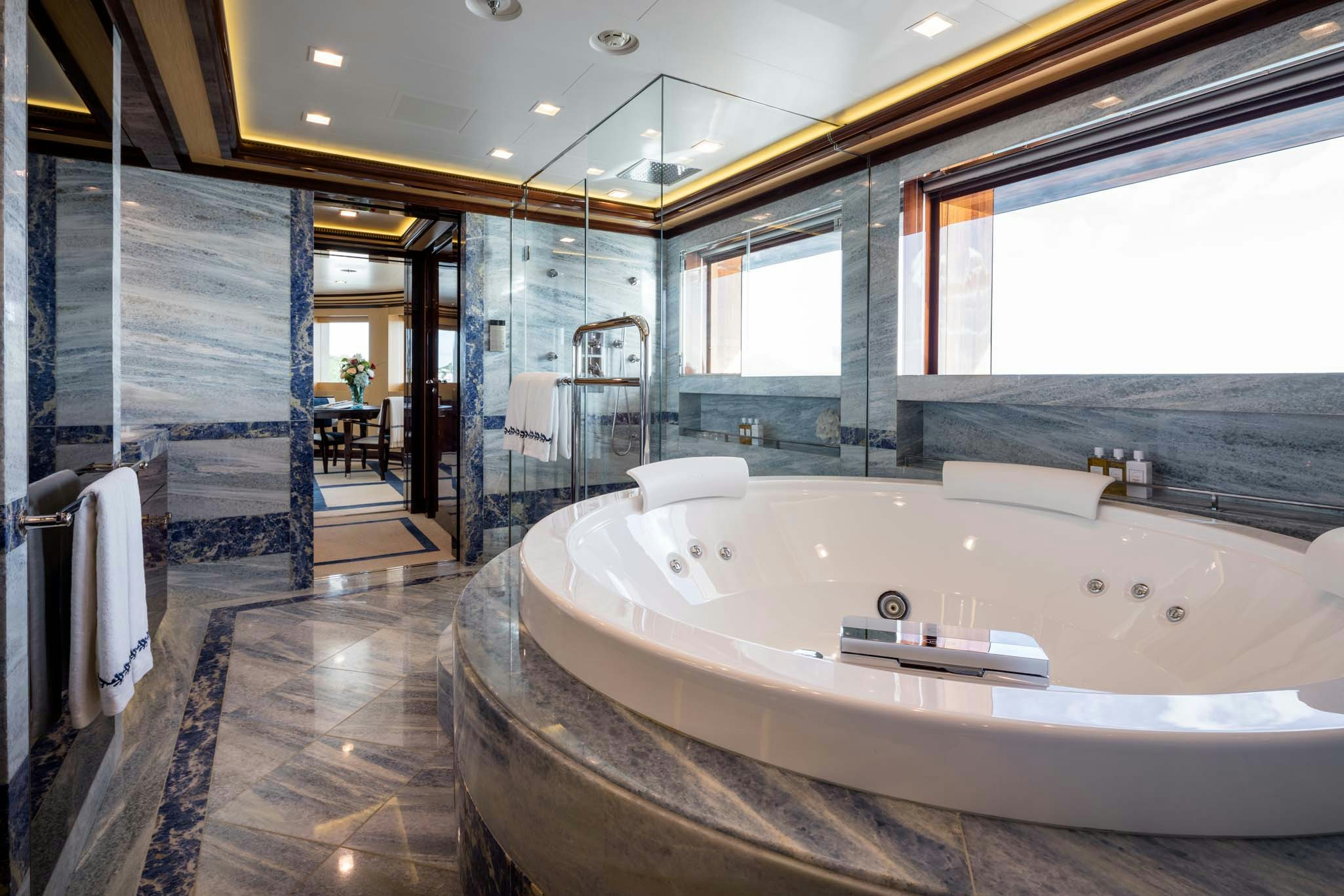 a bathroom with a large tub aboard AXIOMA Yacht for Charter