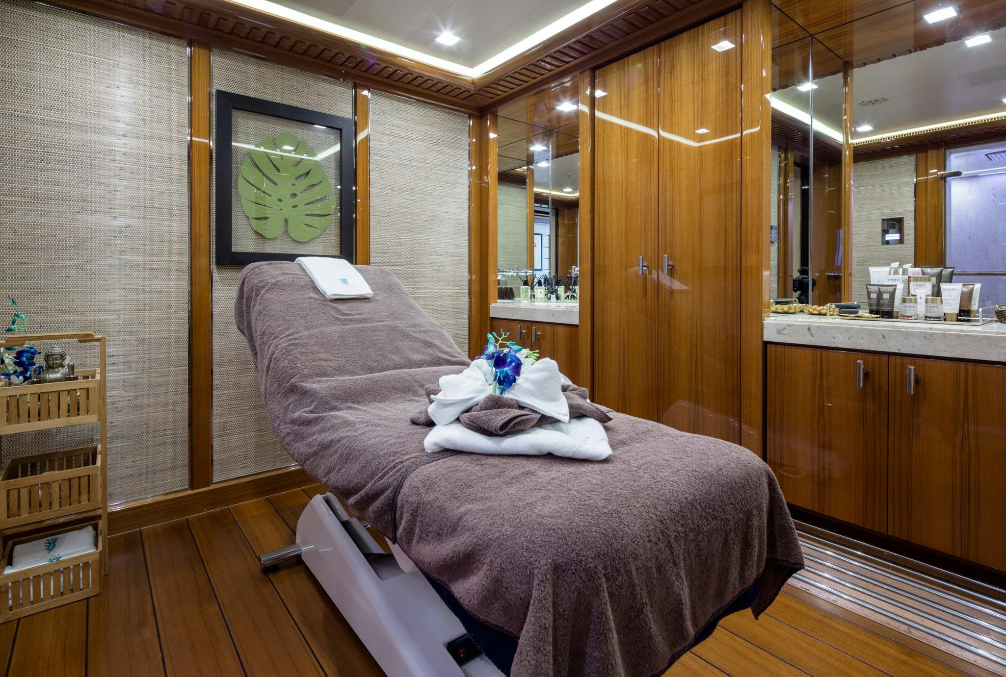 a bed in a room aboard AXIOMA Yacht for Charter