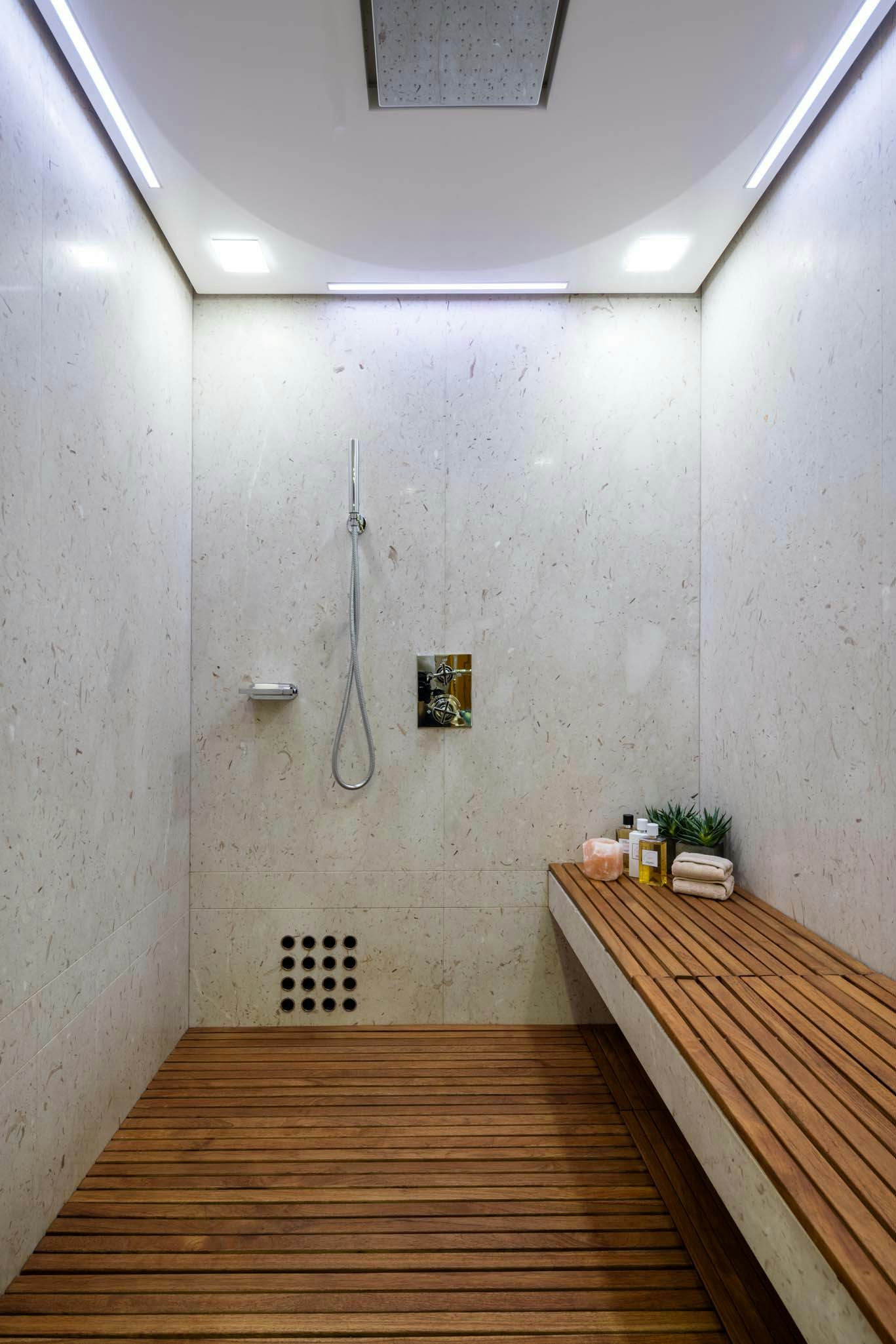 a wooden staircase in a room aboard AXIOMA Yacht for Charter