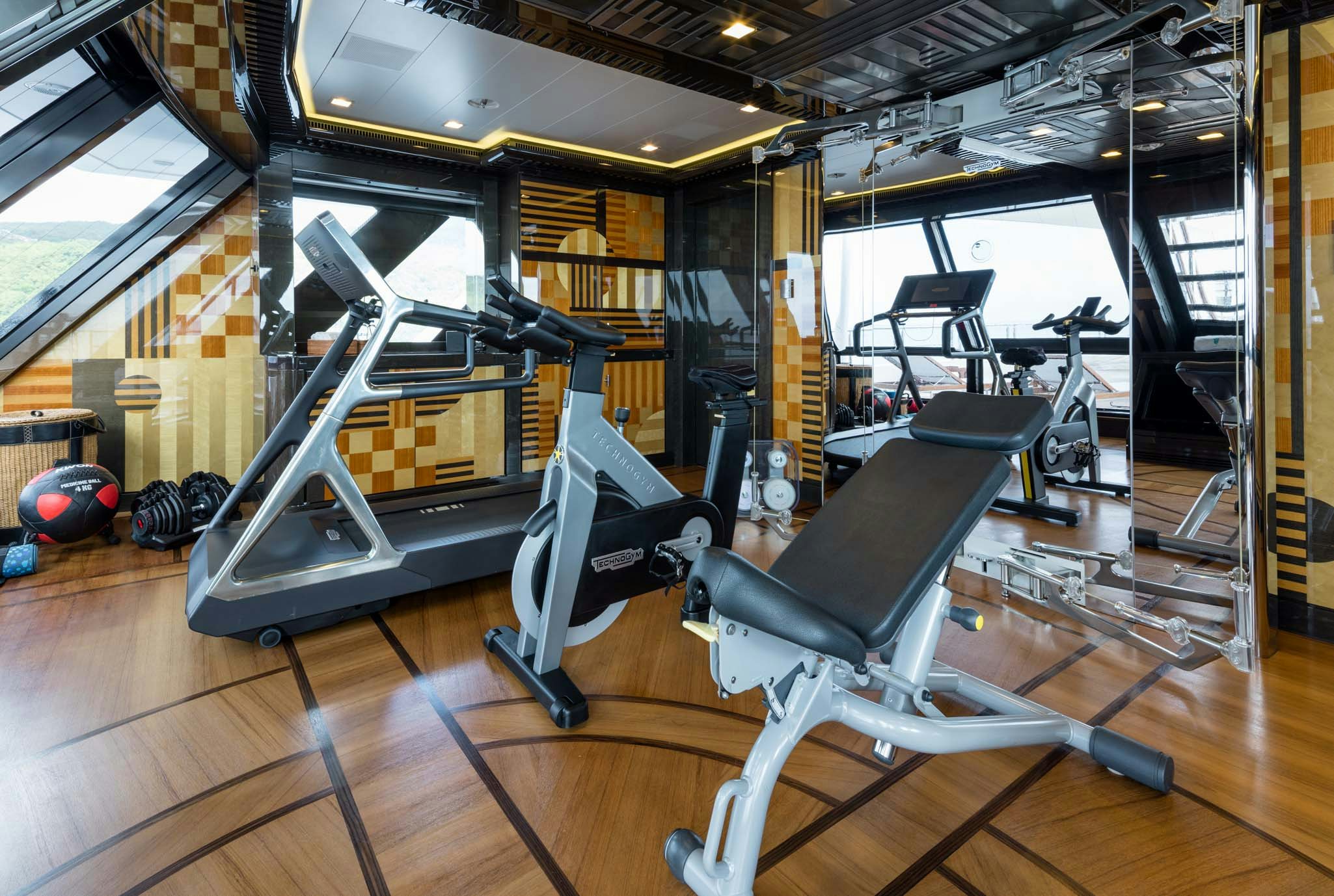 gym with exercise equipment aboard AXIOMA Yacht for Charter
