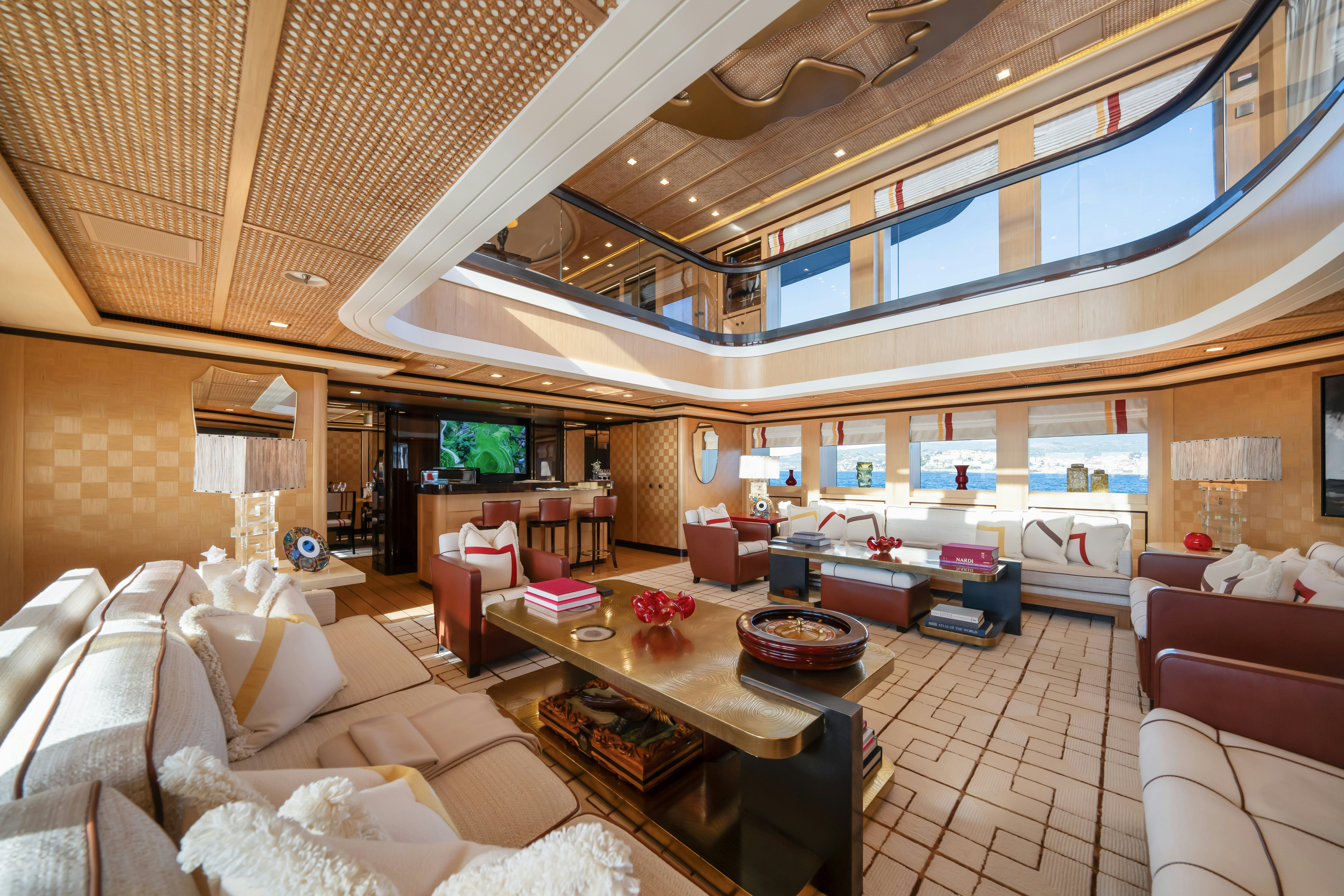 a room with a table and chairs aboard AXIOMA Yacht for Sale