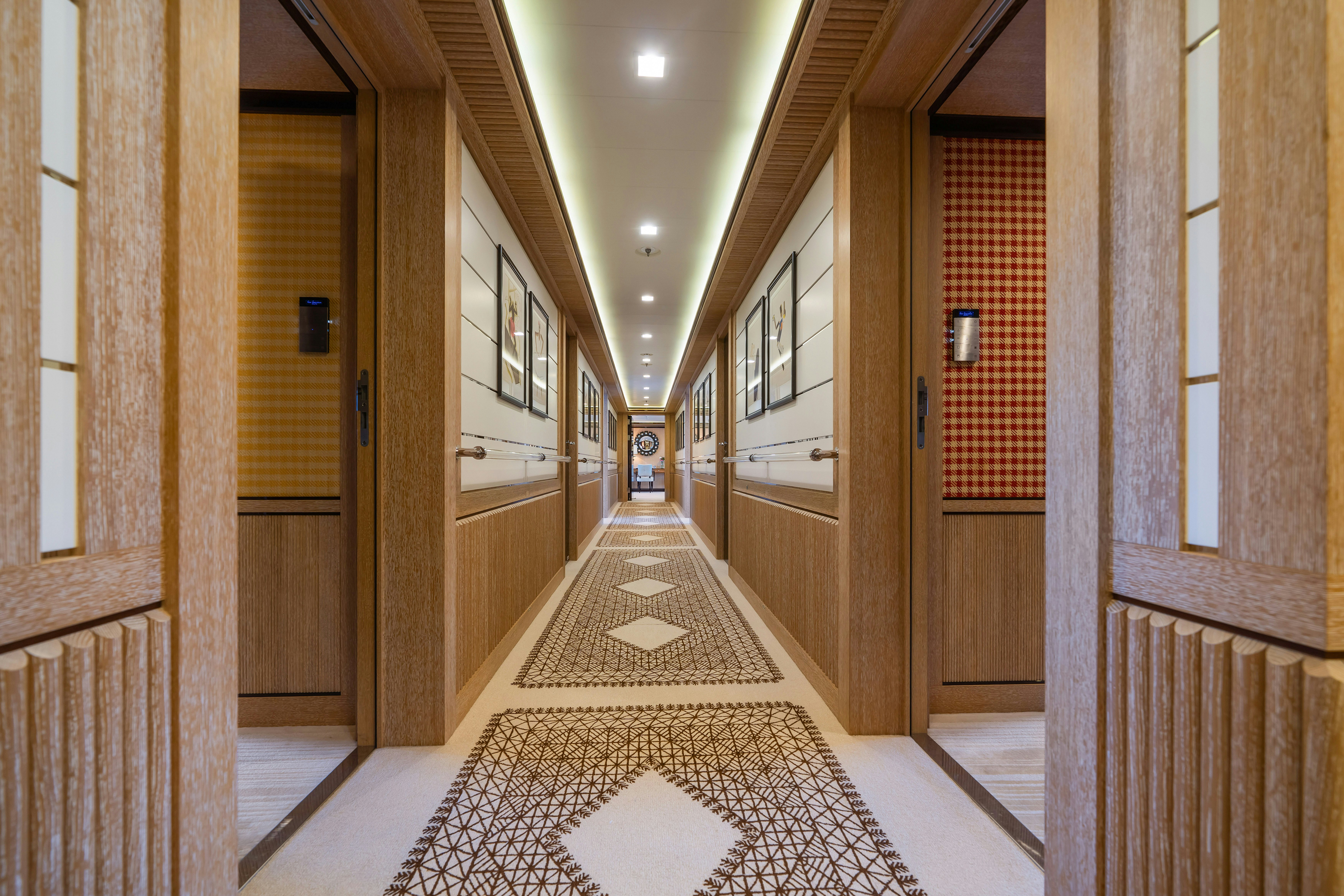 a hallway with doors aboard AXIOMA Yacht for Sale