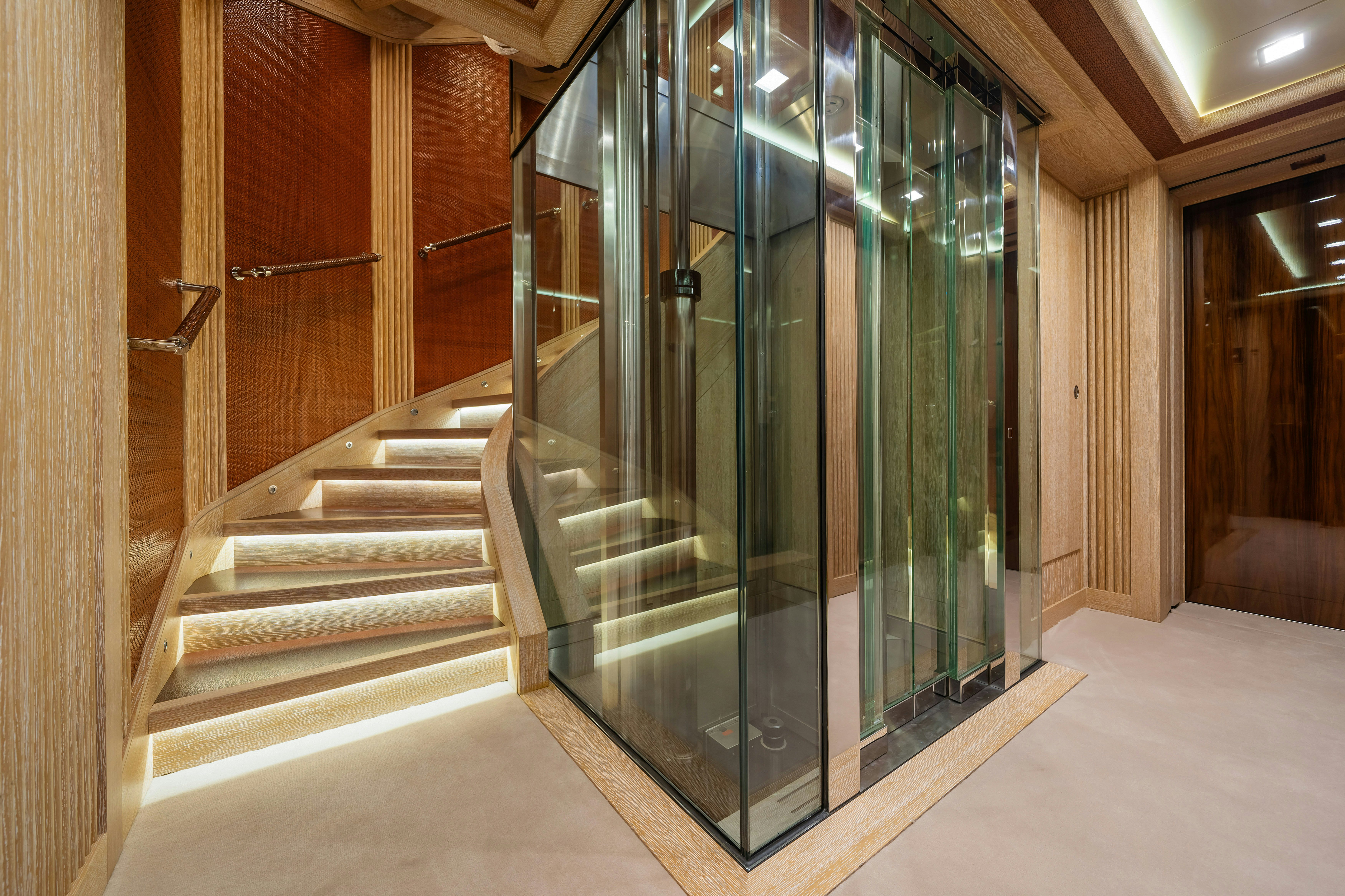 a glass door in a building aboard AXIOMA Yacht for Sale